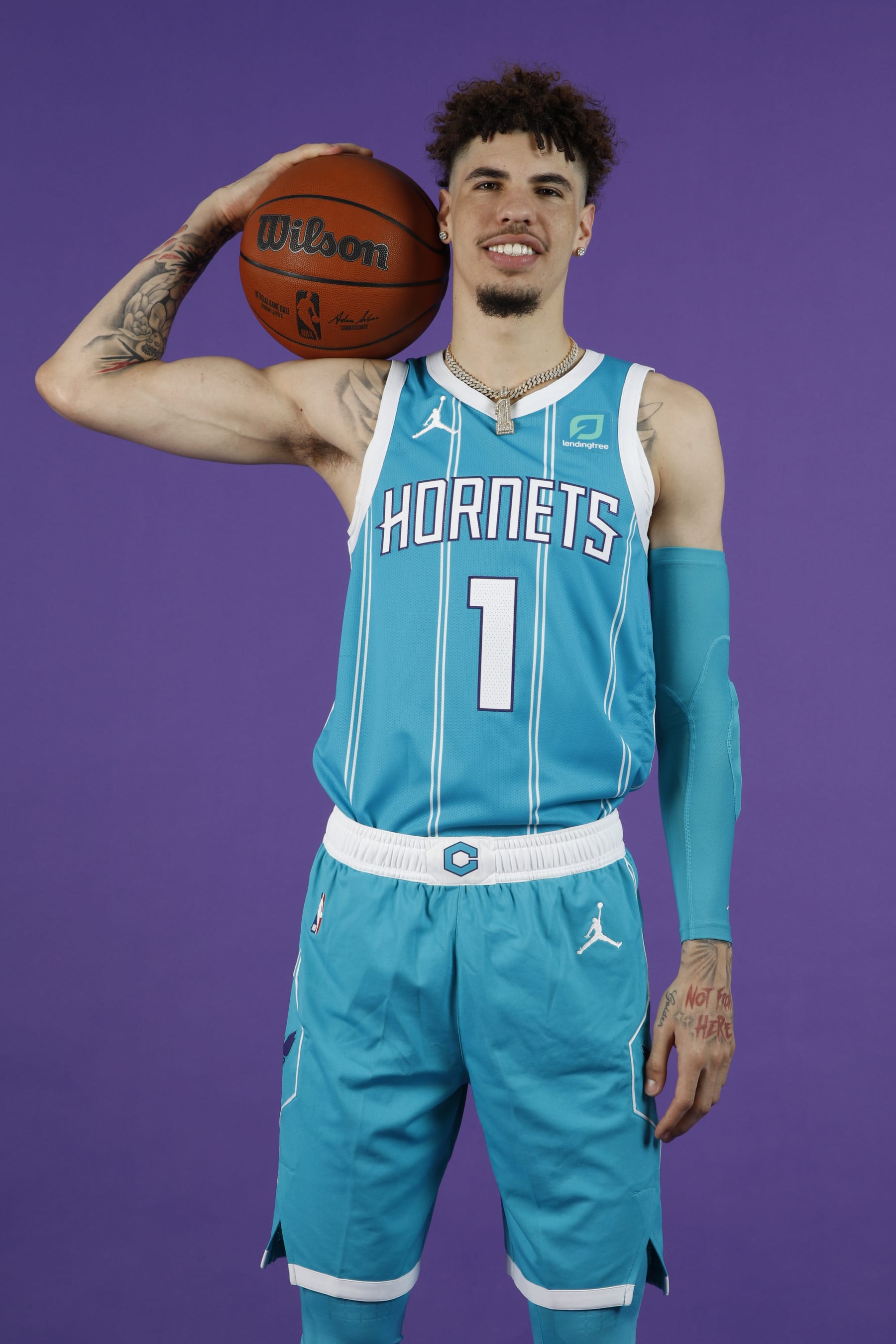 CHARLOTTE, NC- JULY 28: LaMelo Ball #1 of the Charlotte Hornets pose for a portrait at the Spectrum Center in Charlotte, North Carolina on July 28, 2022. NOTE TO USER: User expressly acknowledges and agrees that, by downloading and or using this photograph, User is consenting to the terms and conditions of the Getty Images License Agreement. Mandatory Copyright Notice: Copyright 2022 NBAE (Photo by Kent Smith/NBAE via Getty Images)