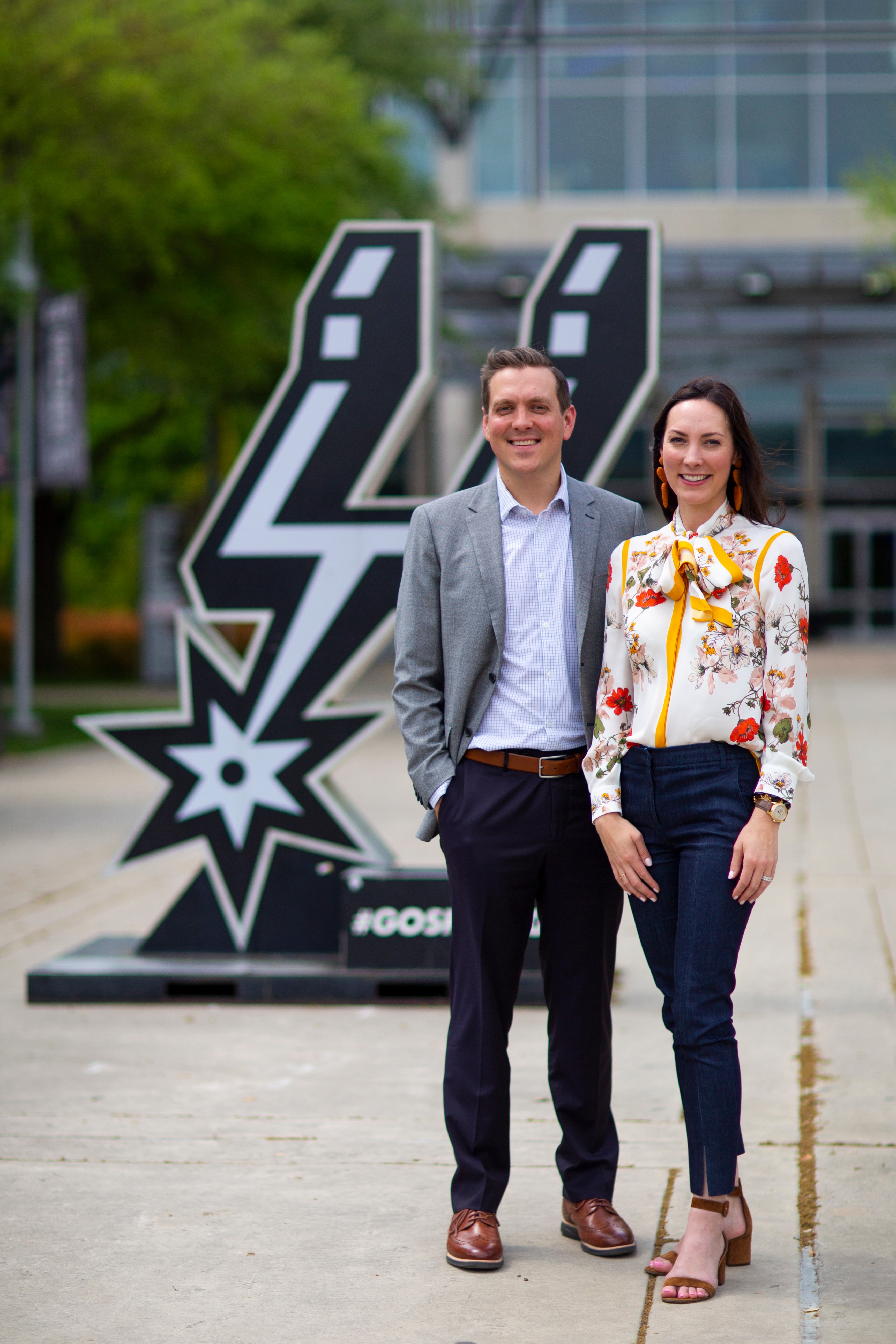 SAN ANTONIO, TX - MARCH 29: Peter J. Holt and Corinna Holt Richter pose for a photo after being announced on the San Antonio Spurs organizations board of managers on March 29, 2019 at the AT&T Center in San Antonio, Texas. NOTE TO USER: User expressly acknowledges and agrees that, by downloading and or using this photograph, user is consenting to the terms and conditions of the Getty Images License Agreement. Mandatory Copyright Notice: Copyright 2019 NBAE (Photos by Ben Fox/NBAE via Getty Images)