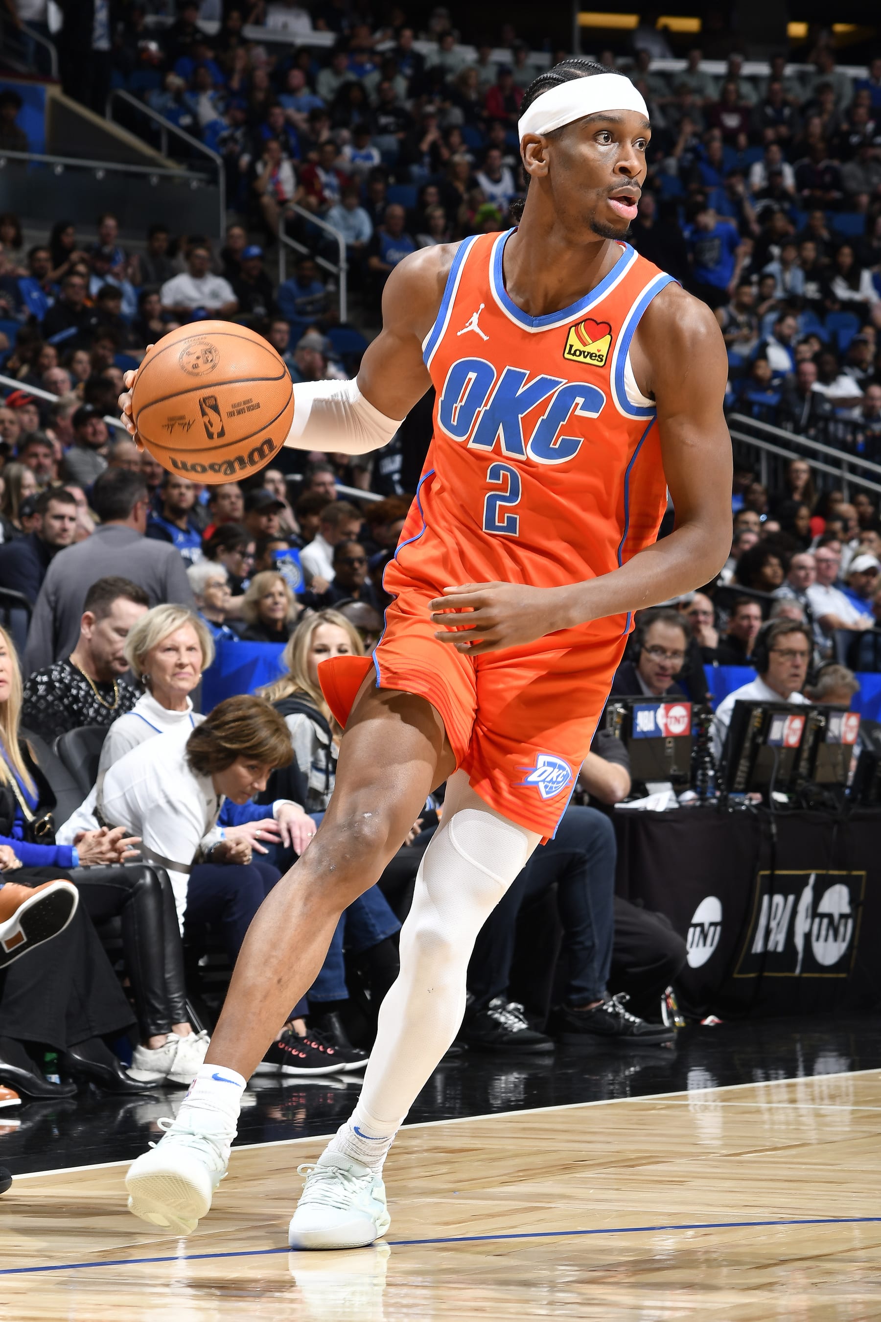 ORLANDO, FL - FEBRUARY 13: Shai Gilgeous-Alexander #2 of the Oklahoma City Thunder dribbles the ball during the game against the Orlando Magic on February 13, 2024 at the Kia Center in Orlando, Florida. NOTE TO USER: User expressly acknowledges and agrees that, by downloading and or using this photograph, User is consenting to the terms and conditions of the Getty Images License Agreement. Mandatory Copyright Notice: Copyright 2024 NBAE (Photo by Fernando Medina/NBAE via Getty Images)