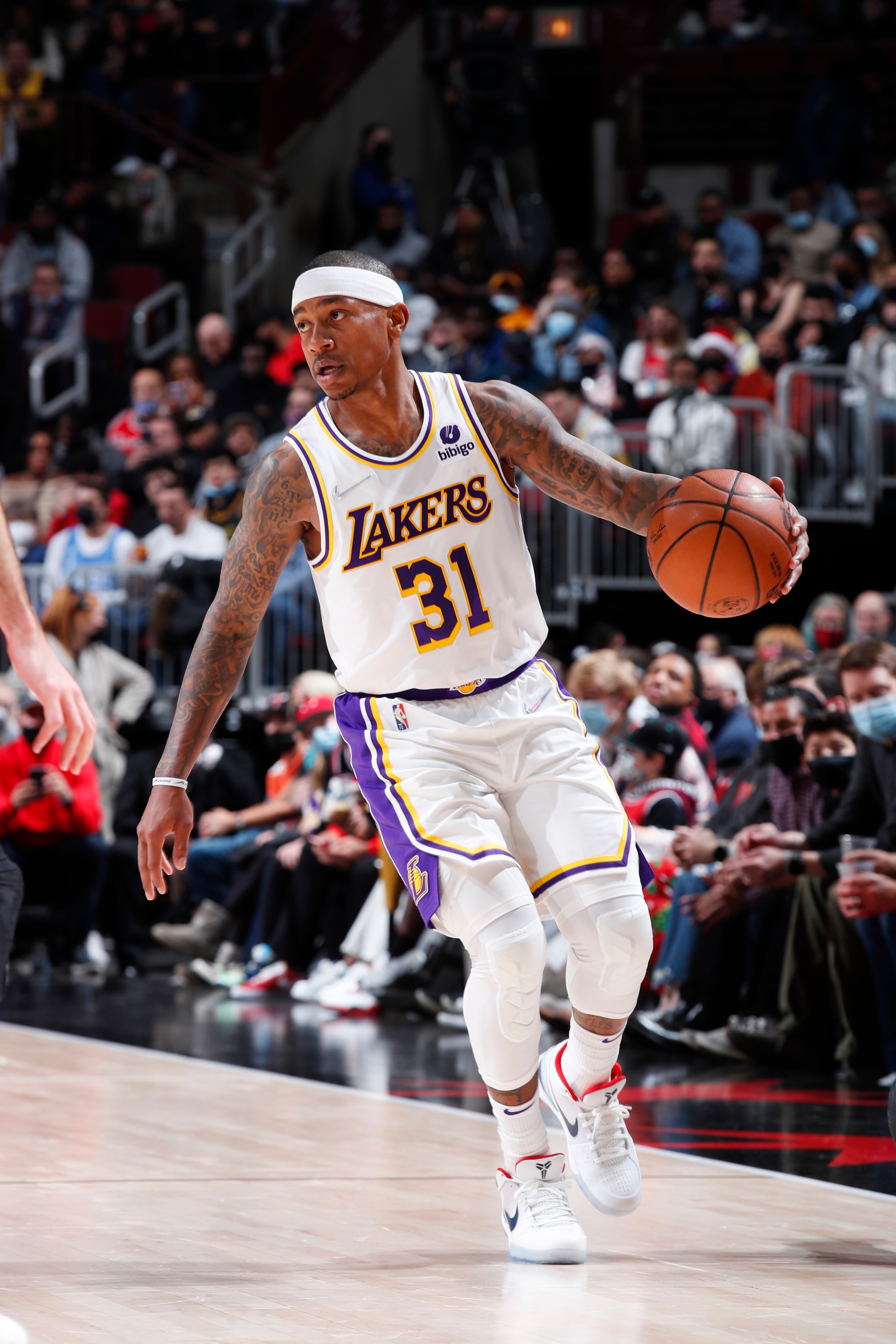 CHICAGO, IL - DECEMBER 19: Isaiah Thomas #31of the Los Angeles Lakers dribbles the ball during the game against the Chicago Bulls on December 19, 2021 at United Center in Chicago, Illinois. NOTE TO USER: User expressly acknowledges and agrees that, by downloading and or using this photograph, User is consenting to the terms and conditions of the Getty Images License Agreement. Mandatory Copyright Notice: Copyright 2021 NBAE (Photo by Jeff Haynes/NBAE via Getty Images)