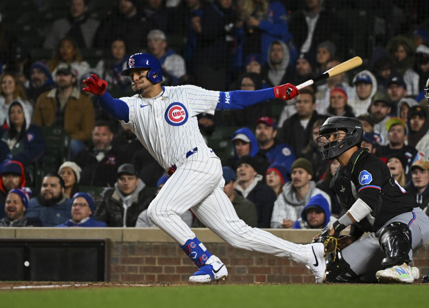 CHICAGO, ILLINOIS - APRIL 20: Christopher Morel #5 of the Chicago Cubs hits a single against the Miami Marlins at Wrigley Field on April 20, 2024 in Chicago, Illinois. (Photo by Nuccio DiNuzzo/Getty Images)