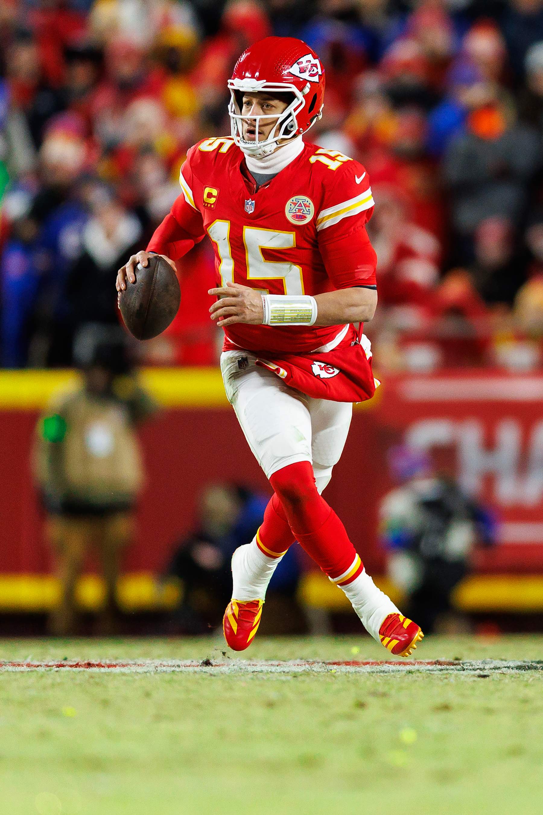 KANSAS CITY, MISSOURI - JANUARY 26: Quarterback Patrick Mahomes #15 of the Kansas City Chiefs scrambles out of the pocket during the second half of the AFC Championship football game against the Buffalo Bills, at GEHA Field at Arrowhead Stadium on January 26, 2025 in Kansas City, Missouri. (Photo by Brooke Sutton/Getty Images)