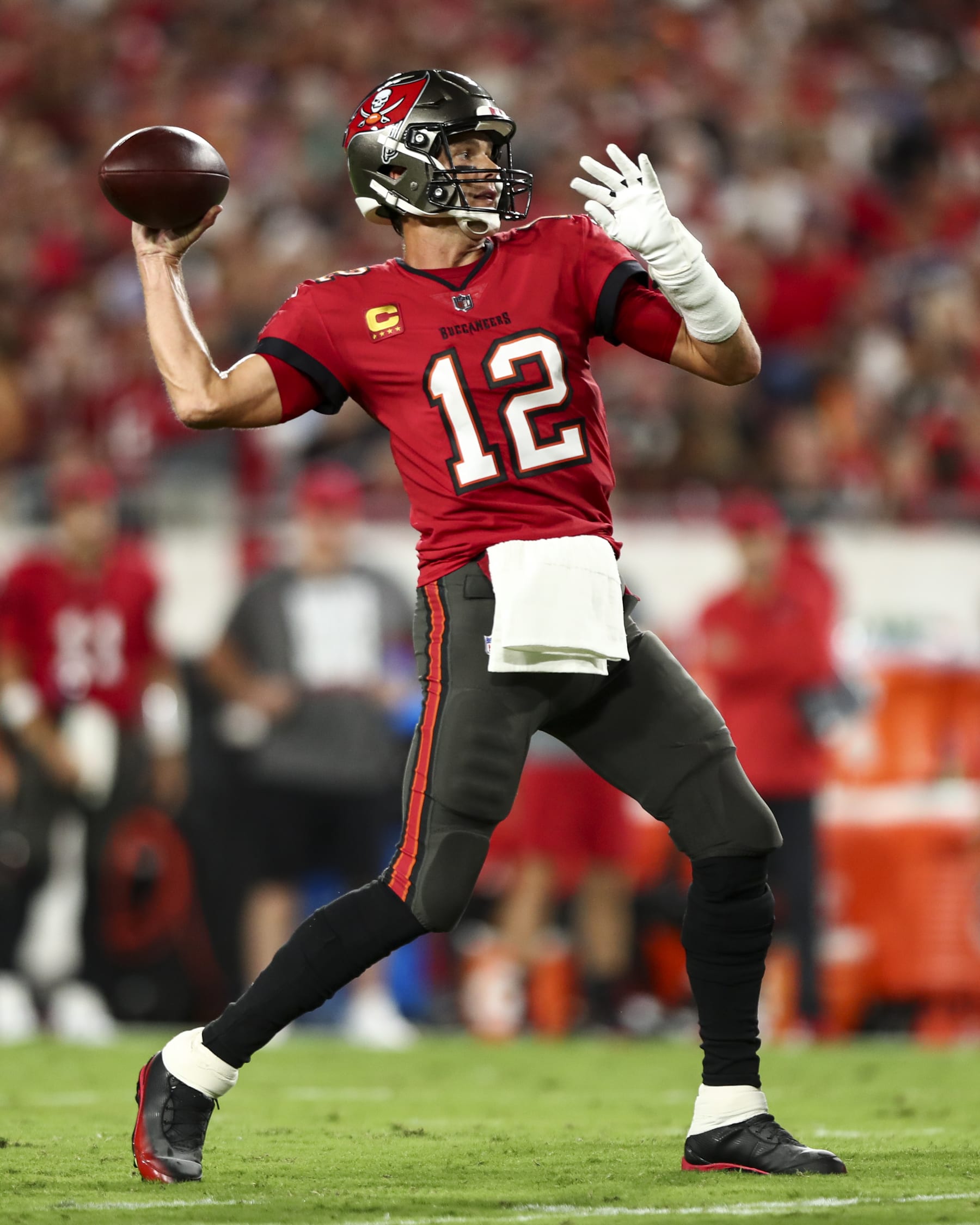 TAMPA, FL - OCTOBER 27: Tom Brady #12 of the Tampa Bay Buccaneers throws a pass during the first quarter of an NFL football game against the Baltimore Ravens at Raymond James Stadium on October 27, 2022 in Tampa, Florida. (Photo by Kevin Sabitus/Getty Images)