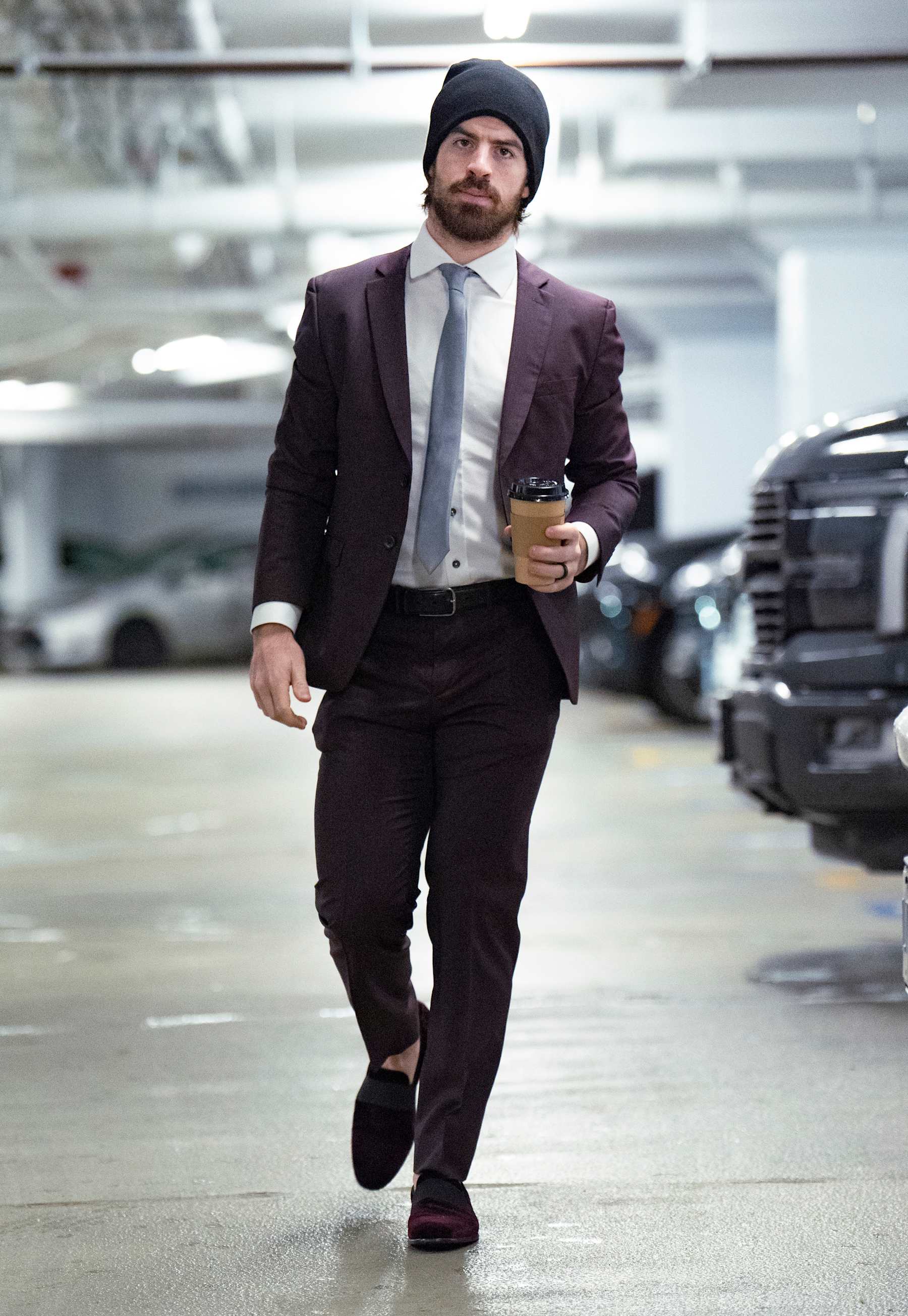 VANCOUVER, CANADA - JANUARY 3: Conor Garland #8 of the Vancouver Canucks walks to the Canucks dressing room before their NHL game against the Nashville Predators at Rogers Arena on January 3, 2025 in Vancouver, British Columbia, Canada.  (Photo by Jeff Vinnick/NHLI via Getty Images)