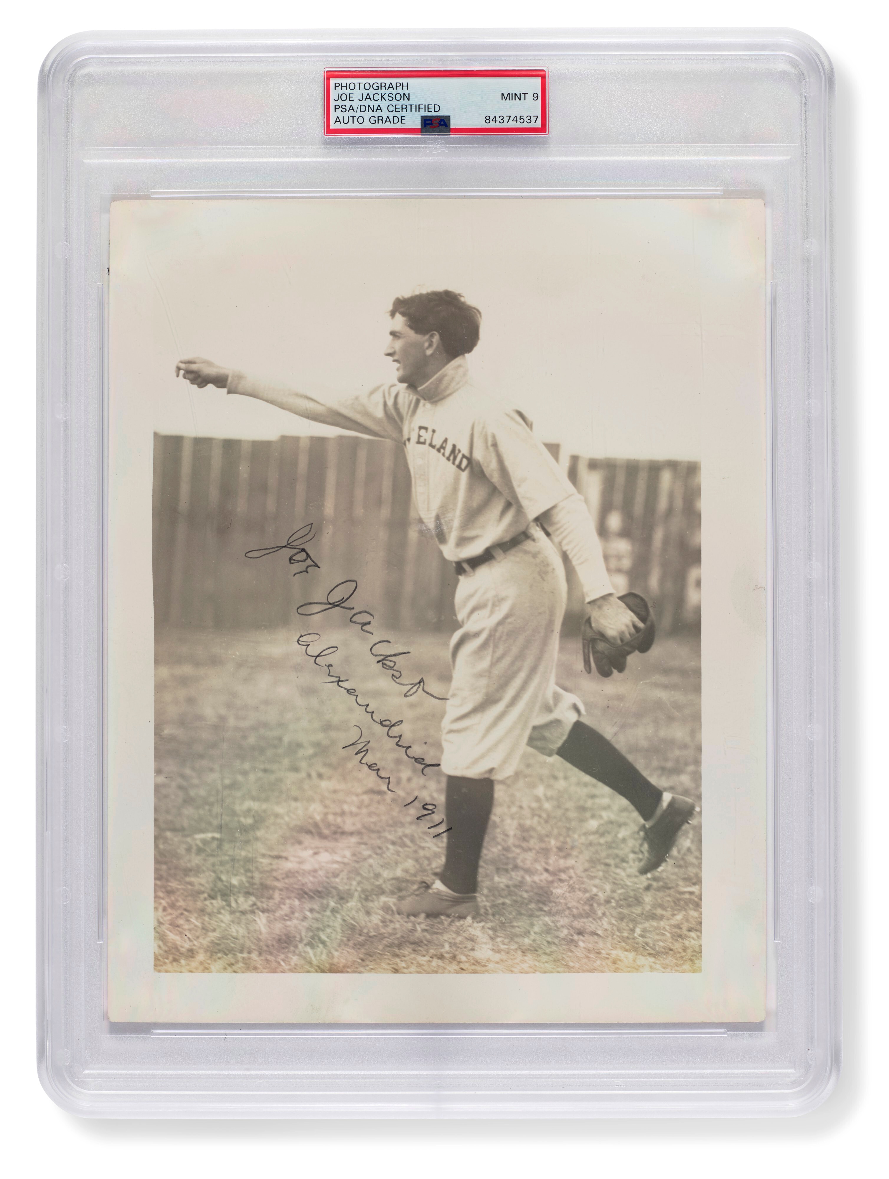 In a photo provided by Christie's and Hunt Auctions, an autographed photo of "Shoeless" Joe Jackson by Frank W. Smith is displayed. The photograph sold for $1.47 million, the most ever paid for a signed sports photograph. The photo was offered by Christie’s and Hunt Auctions in New York in the auction Extra Innings: A Private Collection of Important Baseball Memorabilia. (Christie's and Hunt Auctions via AP)