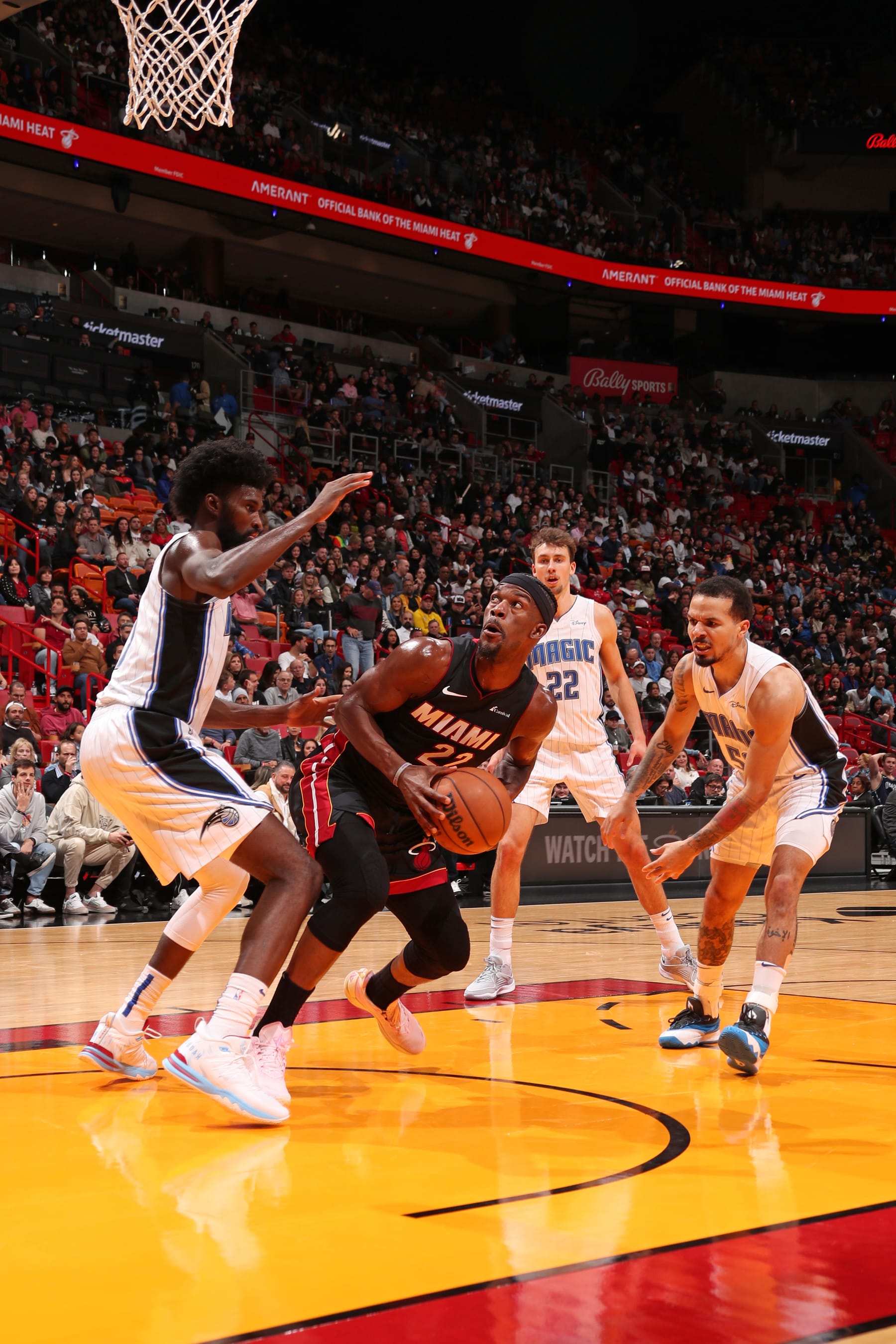MIAMI, FL - FEBRUARY 6:  Jimmy Butler #22 of the Miami Heat handles the ball during the game against the Orlando Magic on February 6, 2024 at Kaseya Center in Miami, Florida. NOTE TO USER: User expressly acknowledges and agrees that, by downloading and or using this Photograph, user is consenting to the terms and conditions of the Getty Images License Agreement. Mandatory Copyright Notice: Copyright 2024 NBAE (Photo by Issac Baldizon/NBAE via Getty Images)