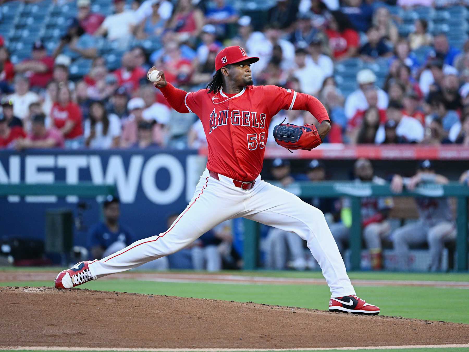 ANAHEIM, CA - AUGUST 16: Los Angeles Angels pitcher Jose Soriano (59) pitching during an MLB baseball game against the Atlanta Braves played on August 16, 2024 at Angel Stadium in Anaheim, CA. (Photo by John Cordes/Icon Sportswire via Getty Images)