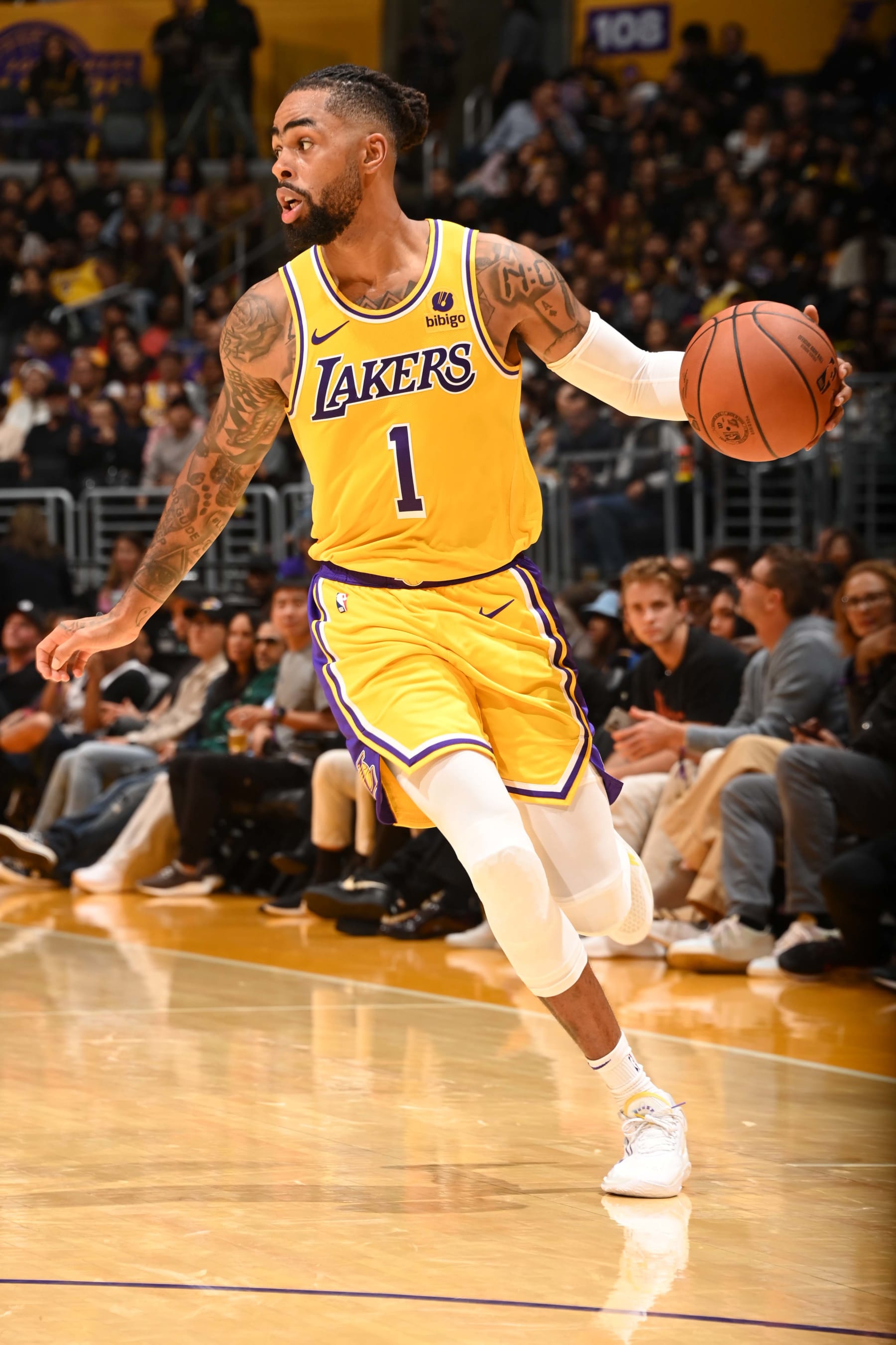 LOS ANGELES, CA - OCTOBER 13: D'Angelo Russell #1 of the Los Angeles Lakers dribbles the ball during the game against the Golden State Warriors on October 13, 2023 at Crypto.Com Arena in Los Angeles, California. NOTE TO USER: User expressly acknowledges and agrees that, by downloading and/or using this Photograph, user is consenting to the terms and conditions of the Getty Images License Agreement. Mandatory Copyright Notice: Copyright 2023 NBAE (Photo by Andrew D. Bernstein/NBAE via Getty Images)