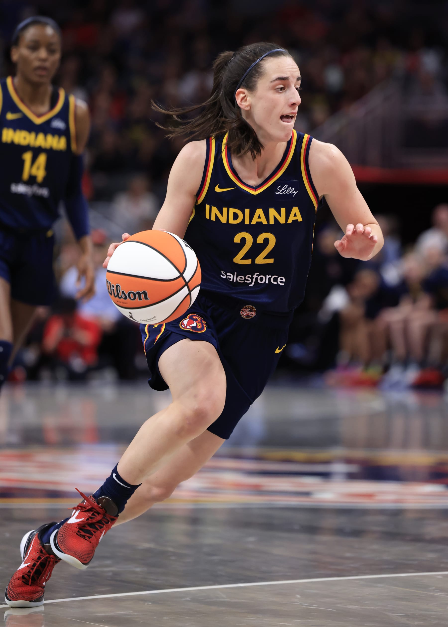INDIANAPOLIS, INDIANA - MAY 28: Caitlin Clark #22 of the Indiana Fever drives to the basket against the Los Angeles Sparks at Gainbridge Fieldhouse on May 28, 2024 in Indianapolis, Indiana. (Photo by Justin Casterline/Getty Images)
