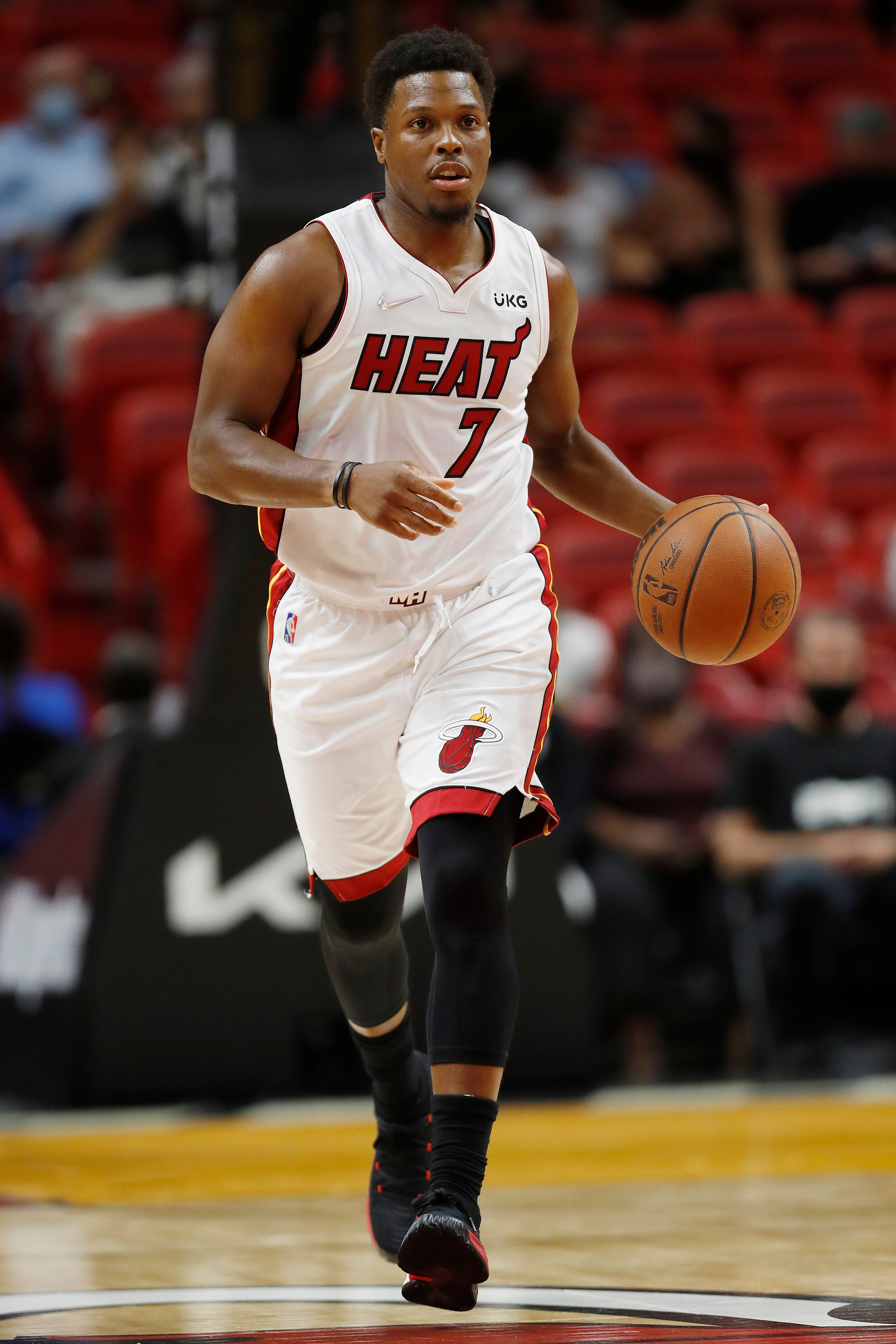 MIAMI, FLORIDA - OCTOBER 15: Kyle Lowry #7 of the Miami Heat in action against the Boston Celtics during the first quarter of a preseason game at FTX Arena on October 15, 2021 in Miami, Florida. NOTE TO USER: User expressly acknowledges and agrees that, by downloading and or using this photograph, User is consenting to the terms and conditions of the Getty Images License Agreement. (Photo by Michael Reaves/Getty Images)