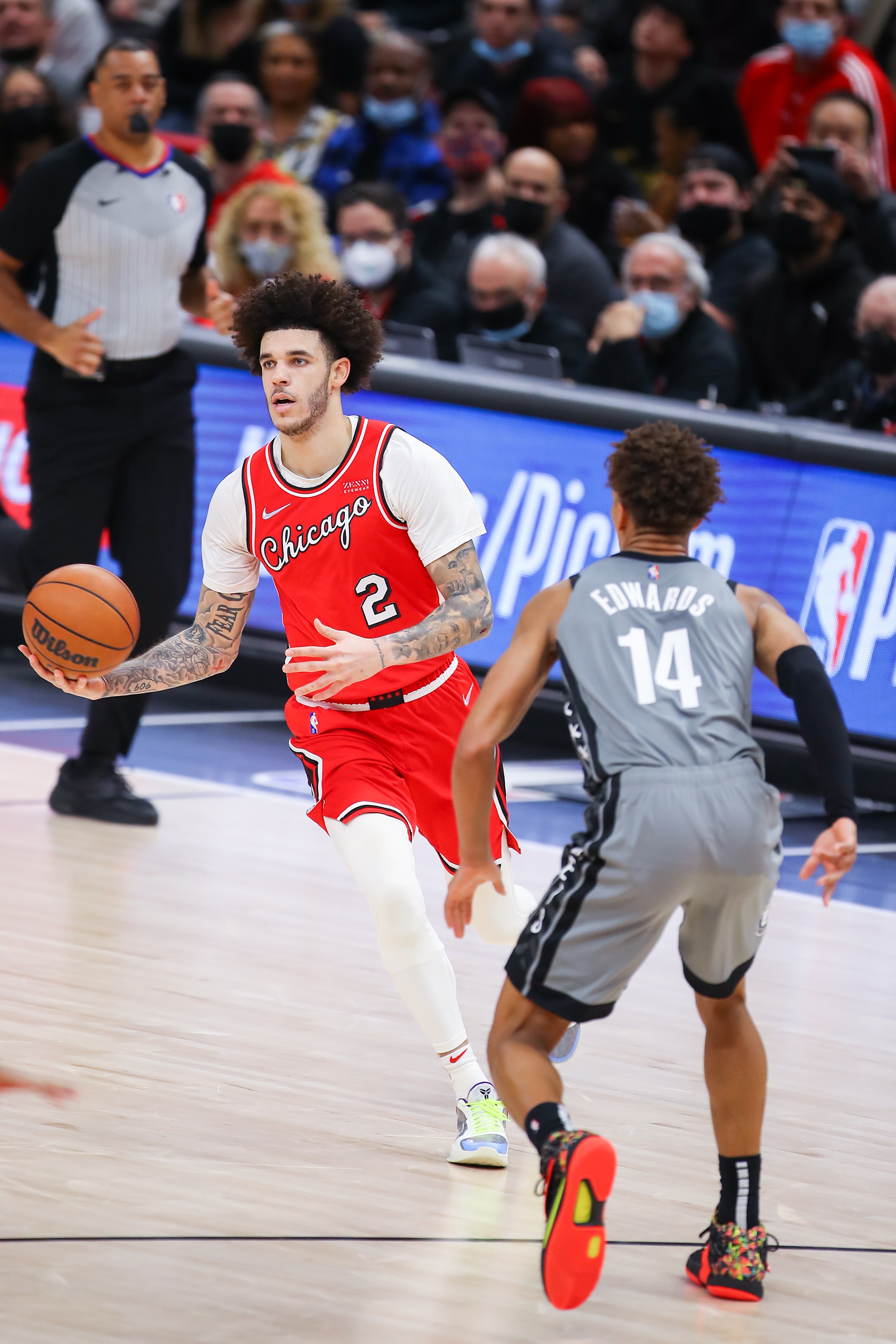 CHICAGO, IL - JANUARY 12: Chicago Bulls Guard Lonzo Ball (2) dribbles the ball in action during a NBA game between the Brooklyn Nets and the Chicago Bulls on January 12, 2022 at the United Center in Chicago, IL. (Photo by Melissa Tamez/Icon Sportswire via Getty Images)