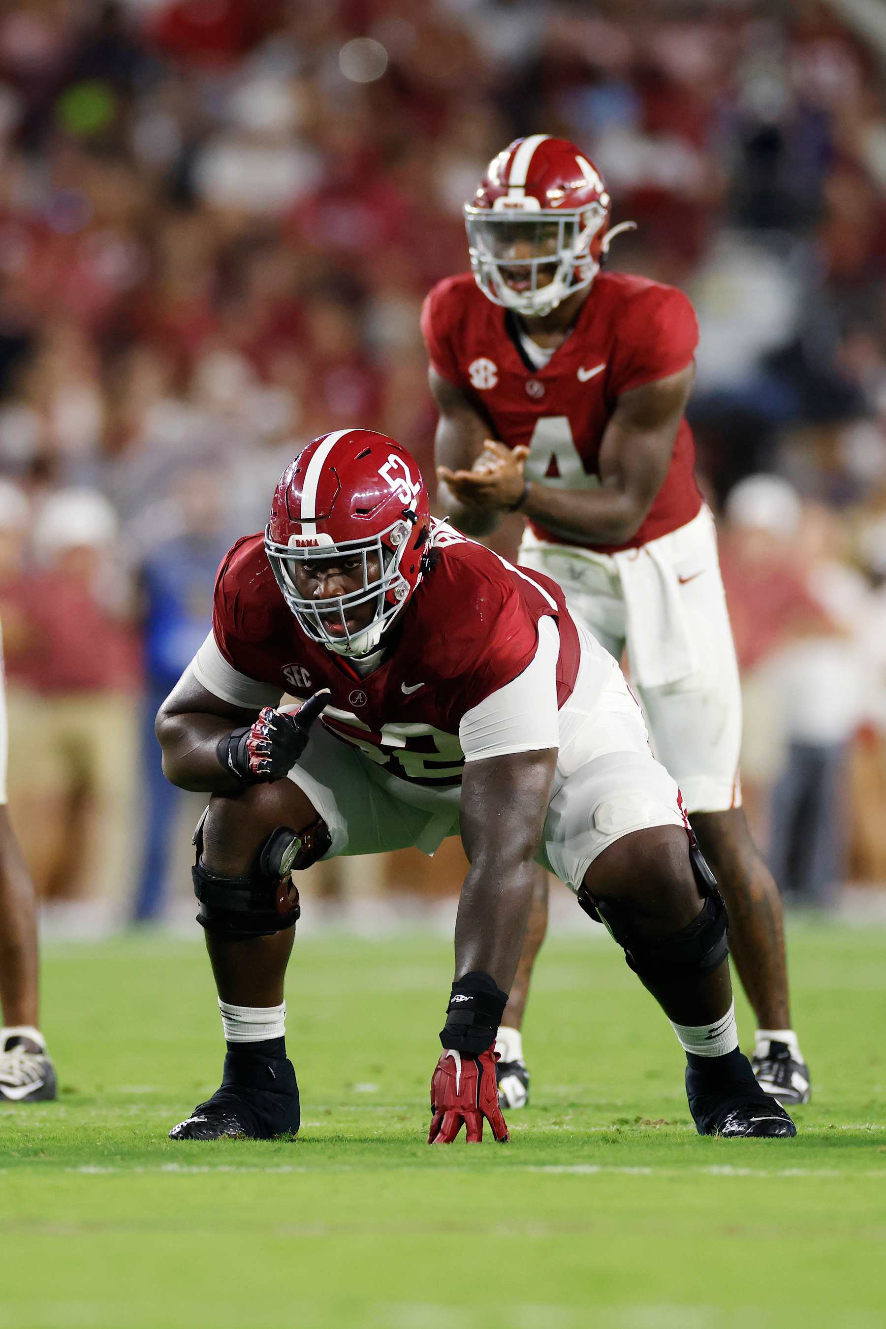 TUSCALOOSA, AL - SEPTEMBER 02: Alabama Crimson Tide offensive lineman Tyler Booker (52) lines up during a college football game against the Middle Tennessee Blue Raiders on September 02, 2023 at Bryant-Denny Stadium in Tuscaloosa, Alabama. (Photo by Joe Robbins/Icon Sportswire via Getty Images)