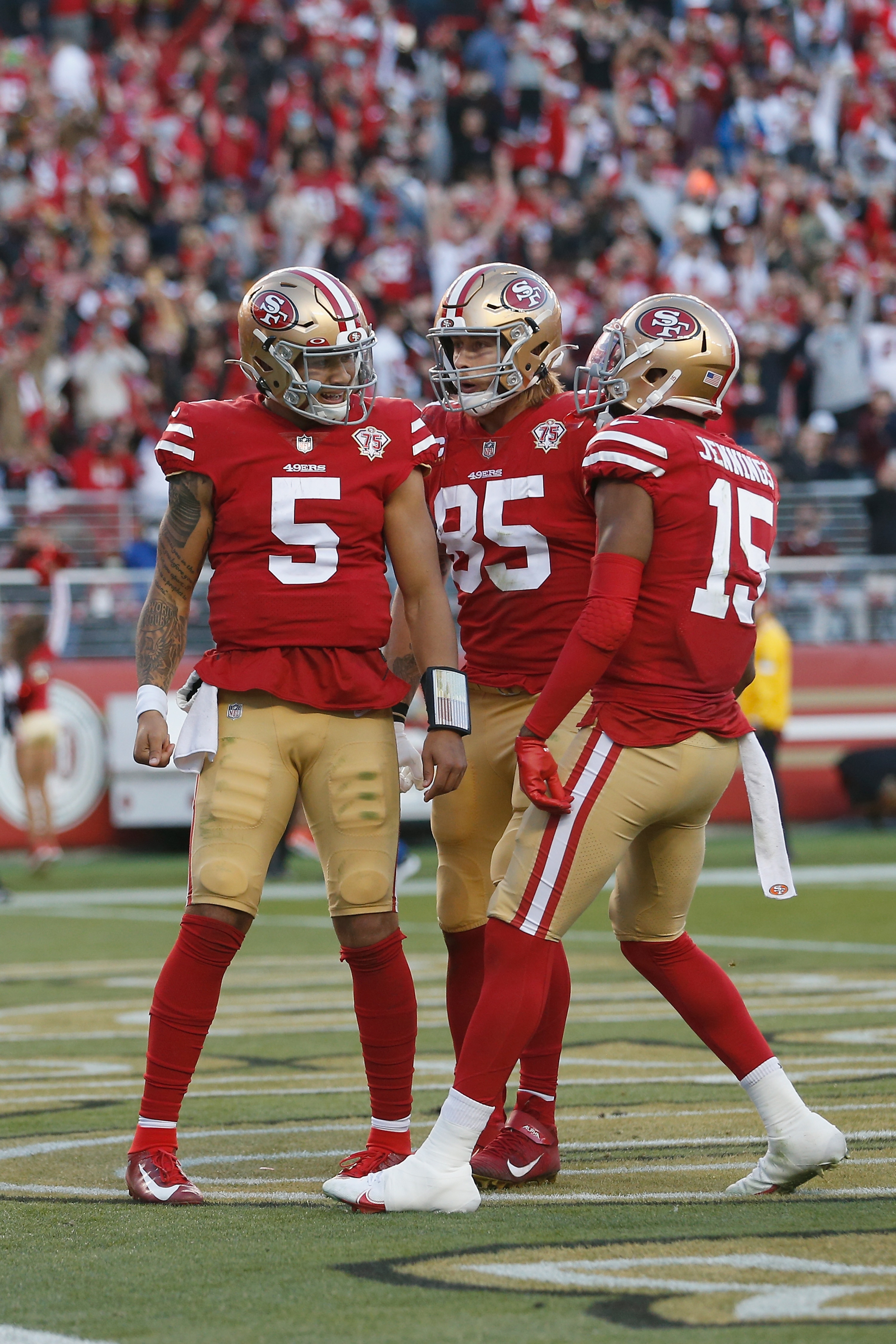 SANTA CLARA, CALIFORNIA - JANUARY 02: Quarterback Trey Lance #5 of the San Francisco 49ers celebrates after running the ball in for a touchdown in the fourth quarter against the Houston Texans at Levi's Stadium on January 02, 2022 in Santa Clara, California. The play was brought back due to an offensive penalty. (Photo by Lachlan Cunningham/Getty Images)