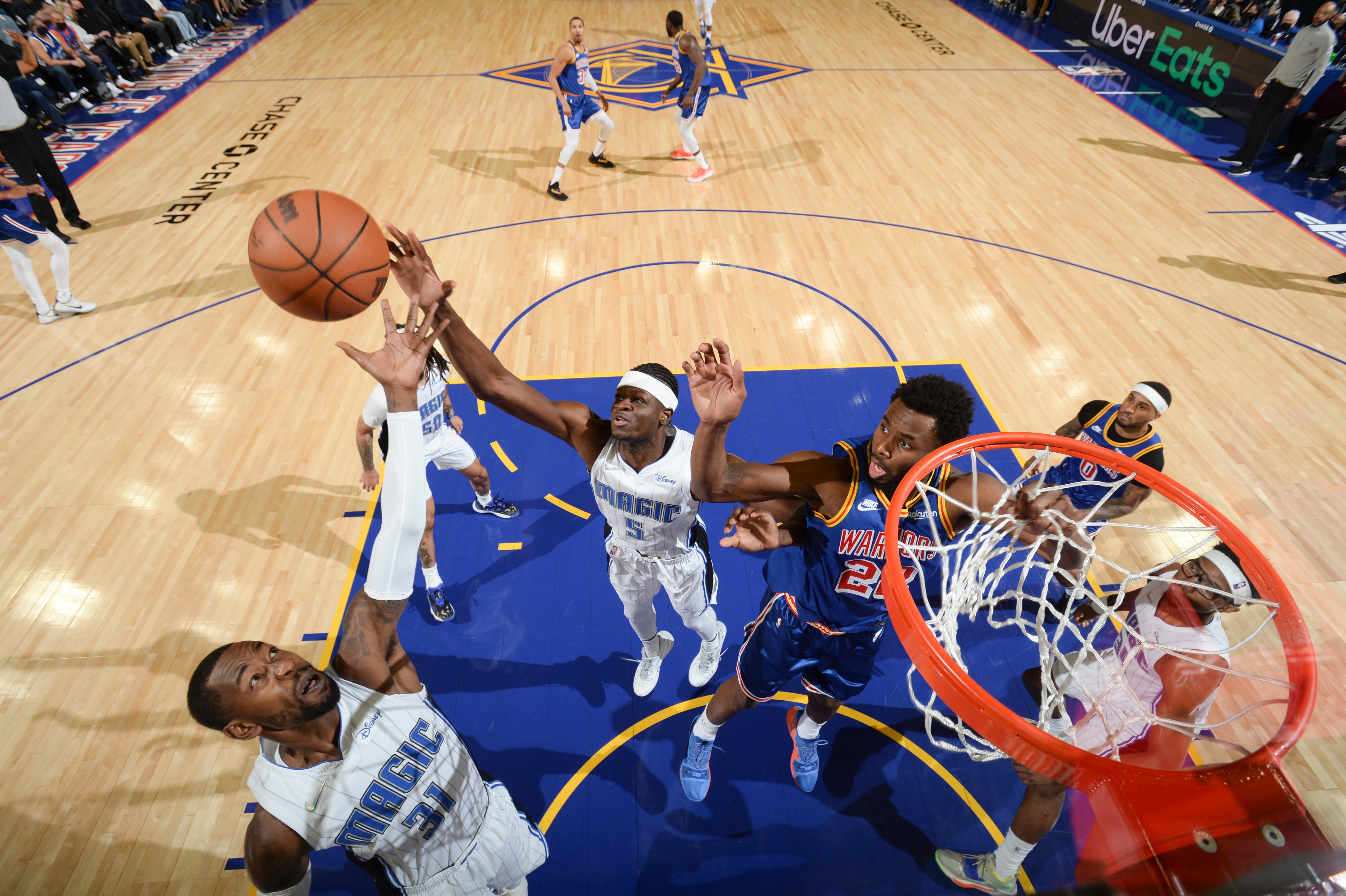 SAN FRANCISCO, CA - DECEMBER 6: Terrence Ross #31 of the Orlando Magic and Mo Bamba #5 of the Orlando Magic fight for the rebound during the game against the Golden State Warriors on December 6, 2021 at Chase Center in San Francisco, California. NOTE TO USER: User expressly acknowledges and agrees that, by downloading and or using this photograph, user is consenting to the terms and conditions of Getty Images License Agreement. Mandatory Copyright Notice: Copyright 2021 NBAE (Photo by Noah Graham/NBAE via Getty Images)
