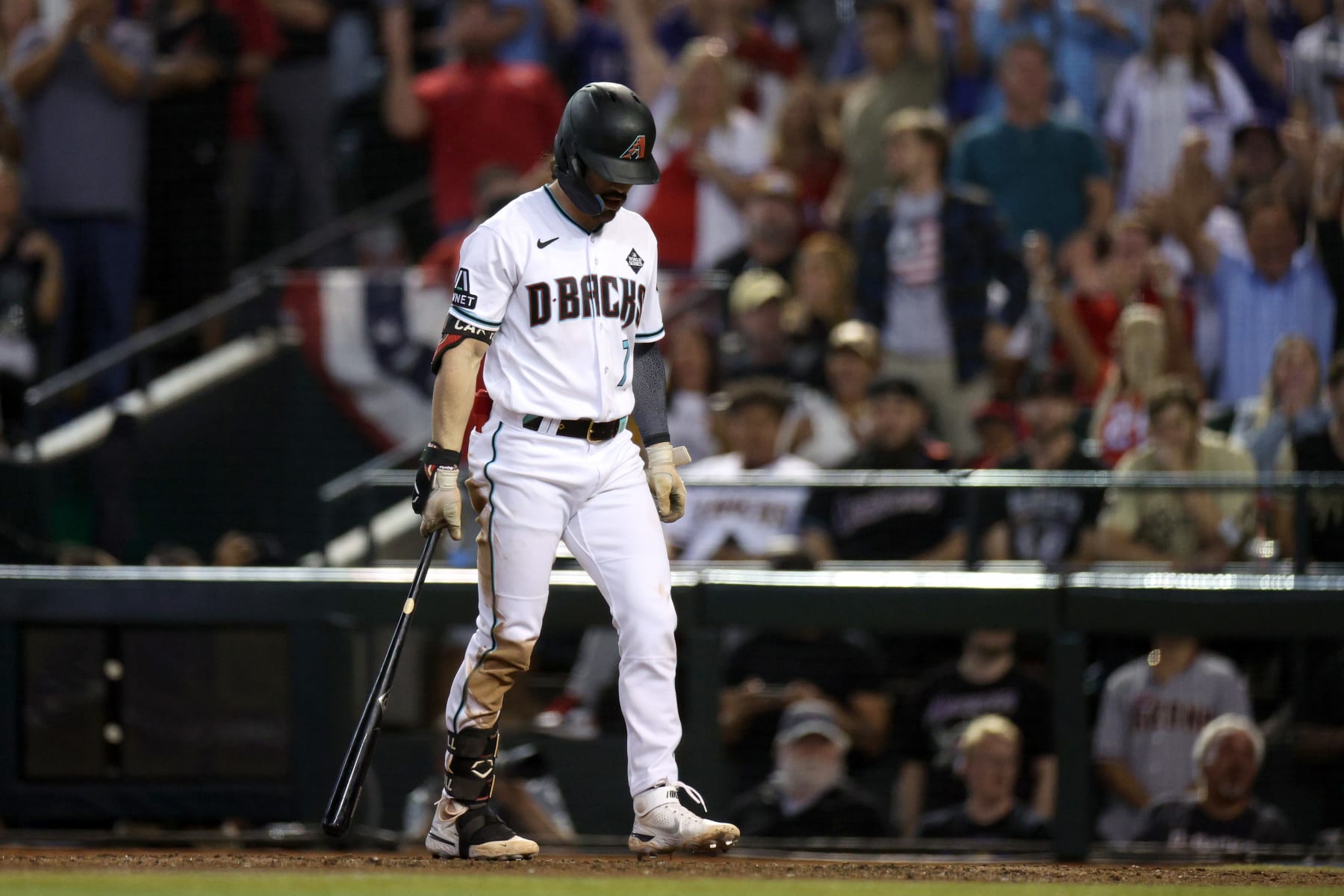 PHOENIX, ARIZONA - NOVEMBER 01: Corbin Carroll #7 of the Arizona Diamondbacks bats in the ninth inning against the Texas Rangers during Game Five of the World Series at Chase Field on November 01, 2023 in Phoenix, Arizona. (Photo by Harry How/Getty Images)