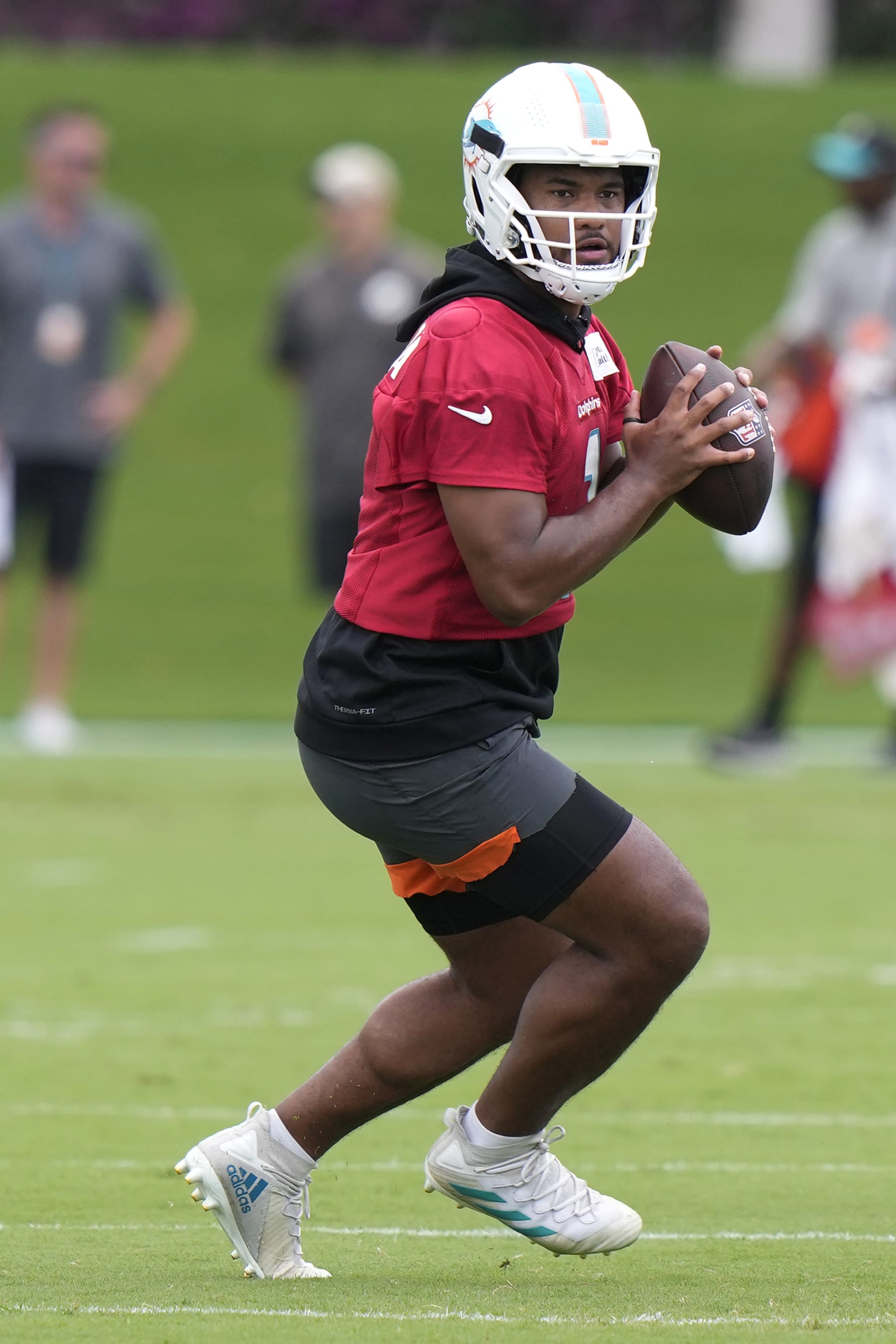 Miami Dolphins quarterback Tua Tagovailoa does drills during practice at the NFL football team's training facility, Wednesday, May 31, 2023, in Miami Gardens, Fla. (AP Photo/Lynne Sladky)