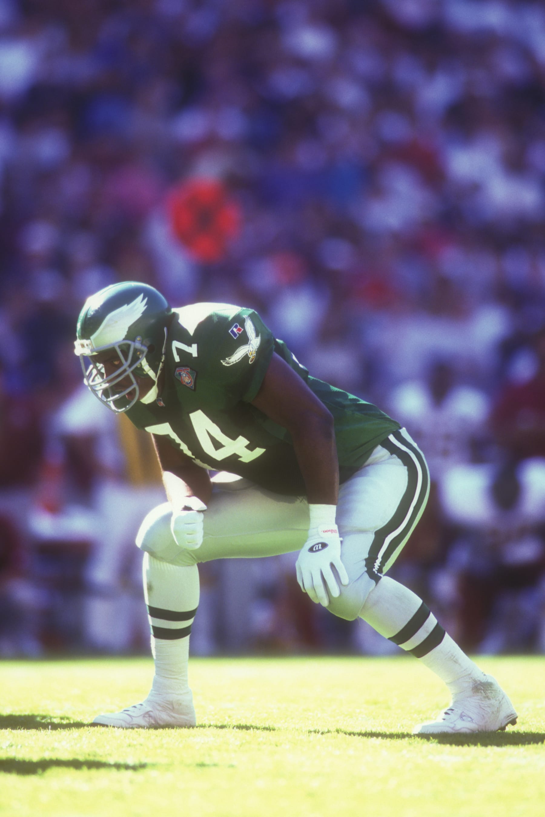 WASHINGTON, DC - OCTOBER 30:  Bernard Williams #74 of the Phialdelphia Eagles in position during a football game against the Washington Redskins on October 30, 1994 at RFK Stadium in Washington DC.  The Eagles won 31-29.  (Photo by Mitchell Layton/Getty Images)