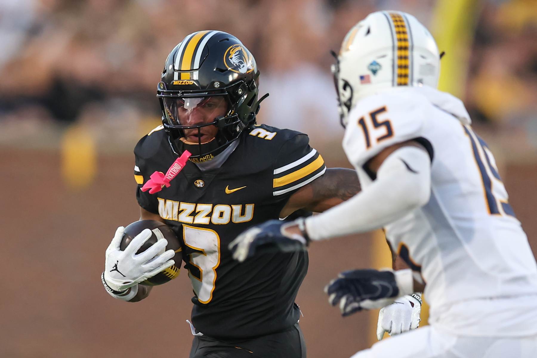 COLUMBIA, MO - AUGUST 29: Missouri Tigers wide receiver Luther Burden III (3) tries to run past Murray State Racers defensive back Trelon Slade (15) in the first quarter of a college football game between the Murray State Racers and Missouri Tigers on August 29, 2024 at Memorial Stadium in Columbia, MO. (Photo by Scott Winters/Icon Sportswire via Getty Images)