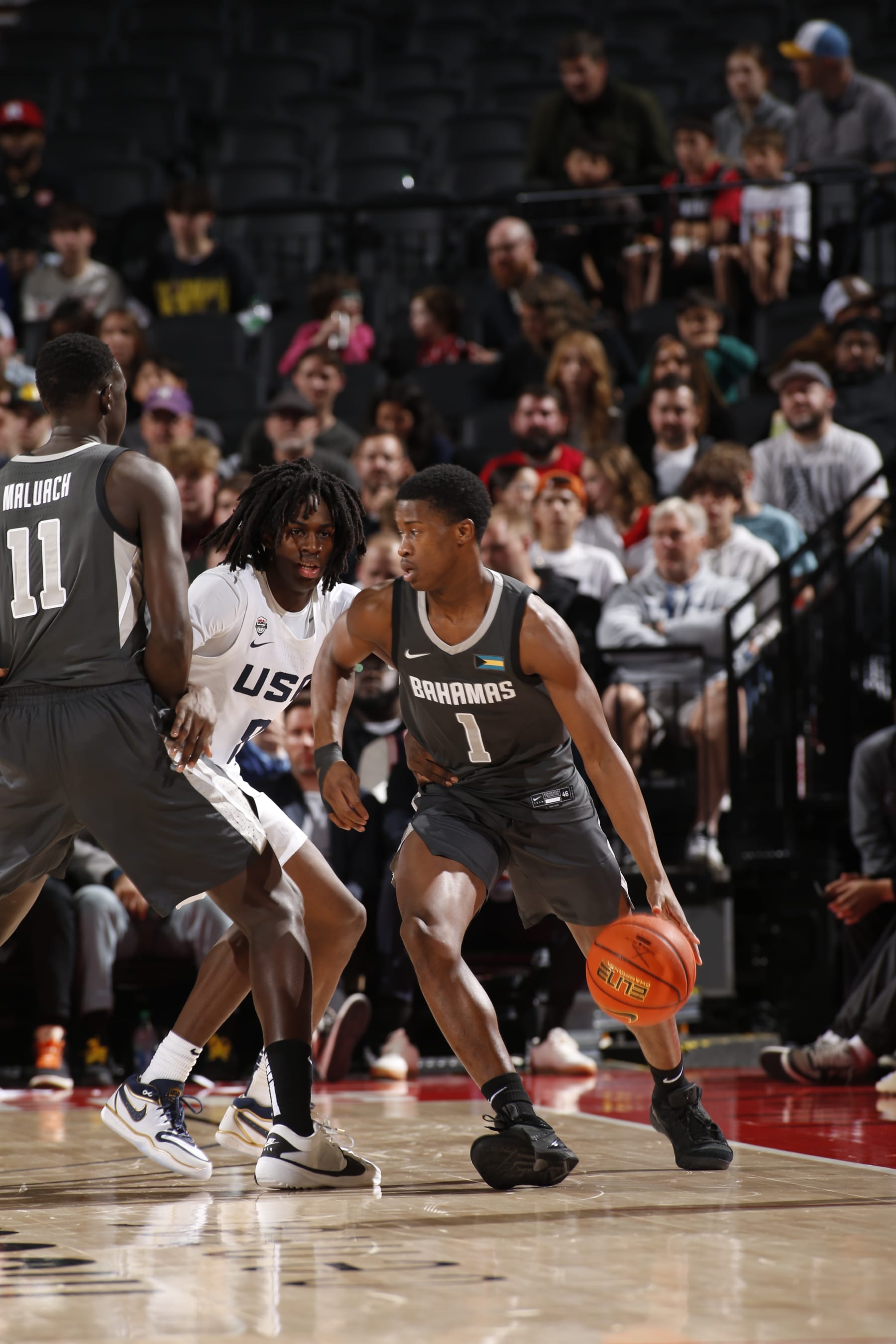 PORTLAND, OR - APRIL 13: VJ Edgecombe #1 of Team World dribbles the ball during the game against Team USA during the 2024 Nike Hoop Summit on April 13, 2024 at the Moda Center Arena in Portland, Oregon. NOTE TO USER: User expressly acknowledges and agrees that, by downloading and or using this photograph, user is consenting to the terms and conditions of the Getty Images License Agreement. Mandatory Copyright Notice: Copyright 2024 NBAE (Photo by Cameron Browne/NBAE via Getty Images)