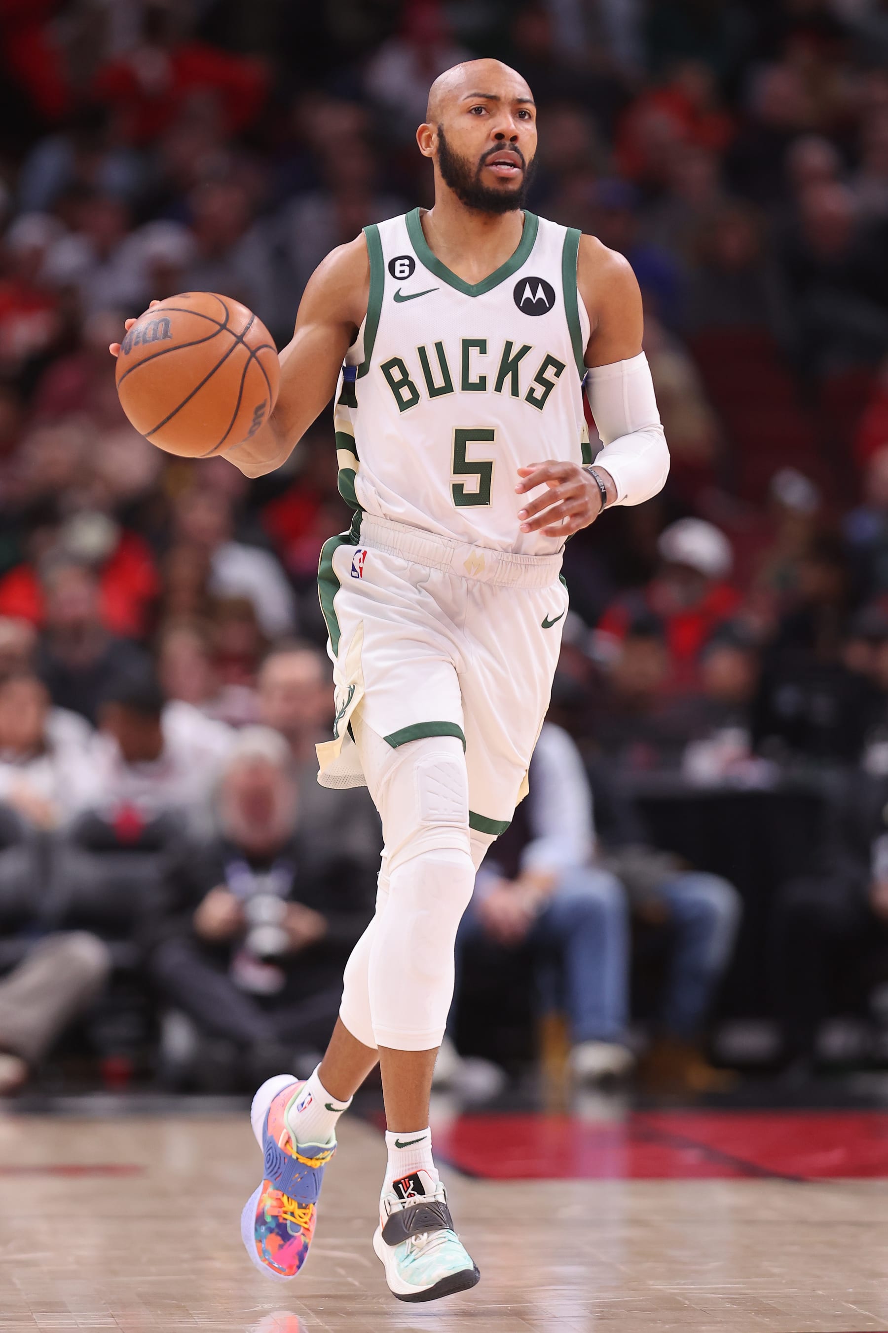 CHICAGO, ILLINOIS - FEBRUARY 16: Jevon Carter #5 of the Milwaukee Bucks in action against the Chicago Bulls during the first half at United Center on February 16, 2023 in Chicago, Illinois. NOTE TO USER: User expressly acknowledges and agrees that, by downloading and or using this photograph, User is consenting to the terms and conditions of the Getty Images License Agreement.  (Photo by Michael Reaves/Getty Images)