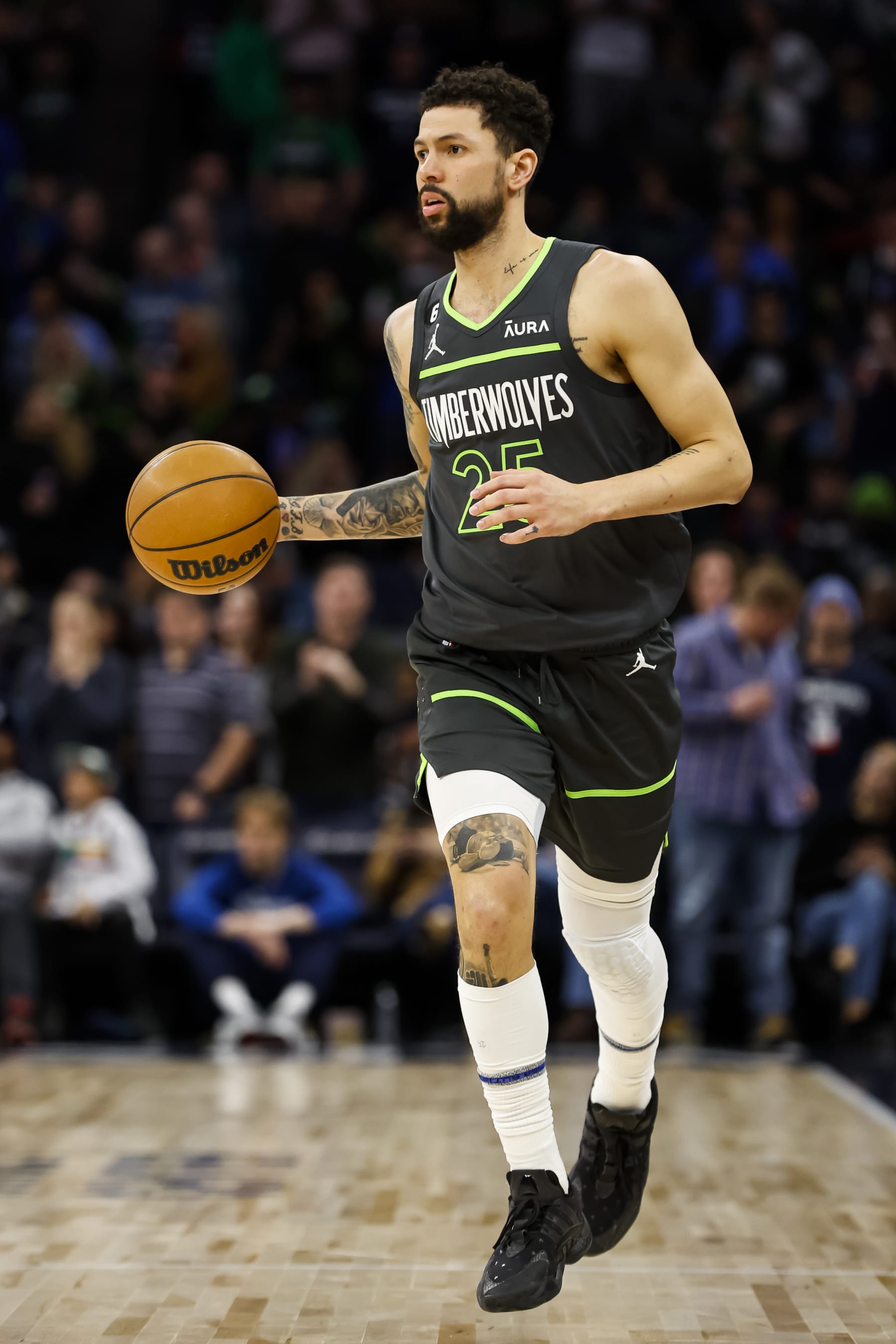 MINNEAPOLIS, MN - JANUARY 21: Austin Rivers #25 of the Minnesota Timberwolves dribbles the ball against the Houston Rockets in the fourth quarter of the game at Target Center on January 21, 2023 in Minneapolis, Minnesota. The Timberwolves defeated the Rockets 113-104. NOTE TO USER: User expressly acknowledges and agrees that, by downloading and or using this Photograph, user is consenting to the terms and conditions of the Getty Images License Agreement. (Photo by David Berding/Getty Images)