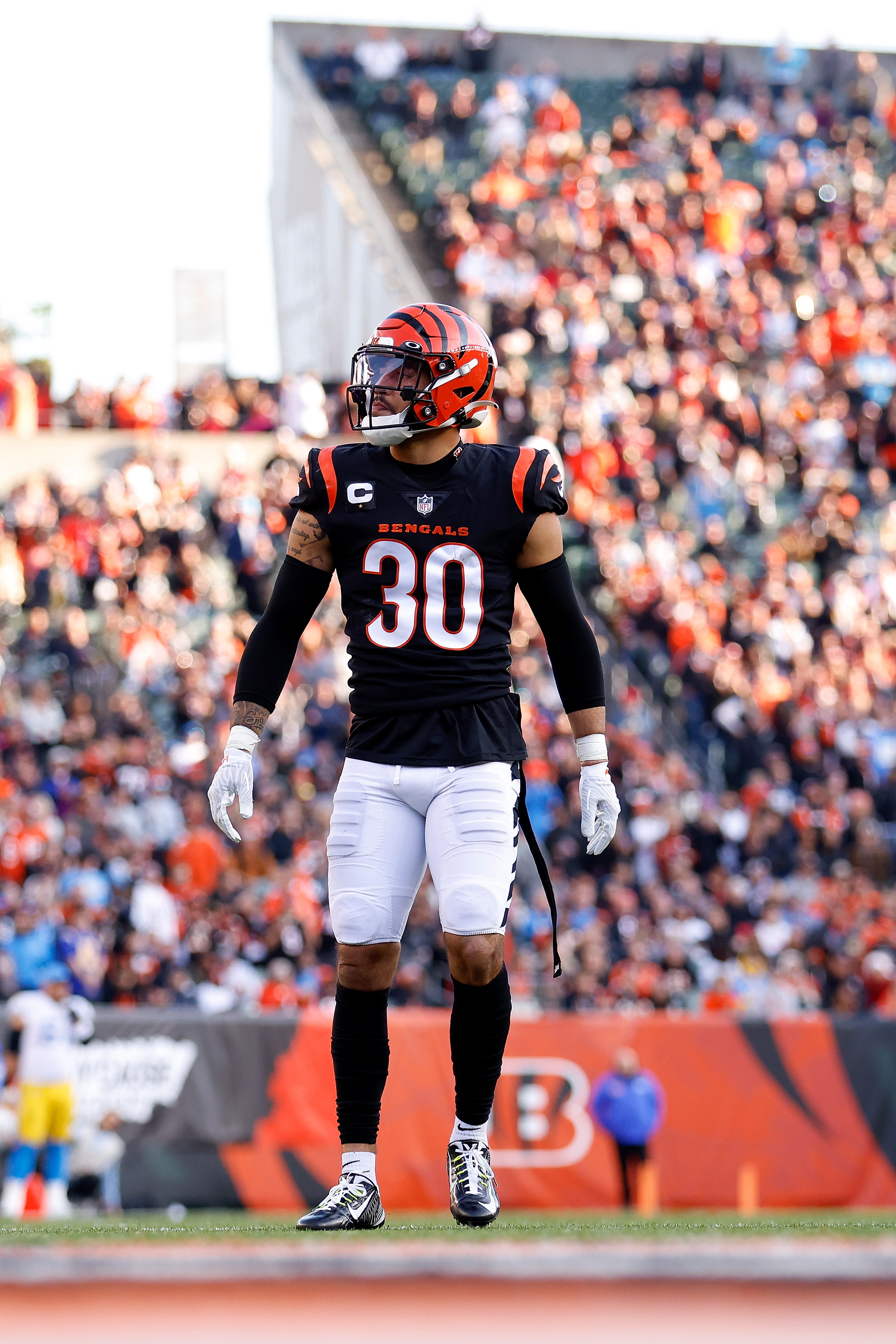 CINCINNATI, OH - DECEMBER 05:  Jessie Bates III #30 of the Cincinnati Bengals walks back to the line of scrimmage during the game against the Los Angeles Chargers at Paul Brown Stadium on December 5, 2021 in Cincinnati, Ohio. (Photo by Kirk Irwin/Getty Images)