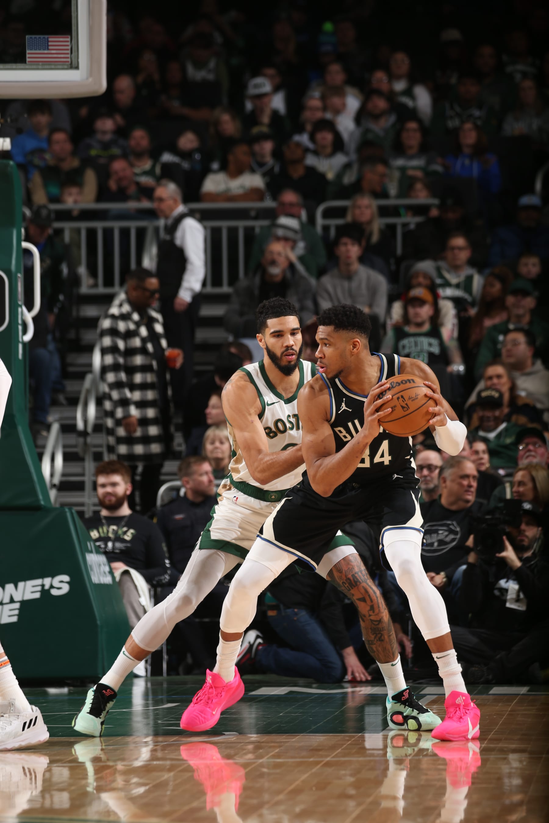 MILWAUKEE, WI - JANUARY 11:  Jayson Tatum #0 of the Boston Celtics plays defense during the game  against Giannis Antetokounmpo #34 of the Milwaukee Bucks on January 11, 2024 at the Fiserv Forum Center in Milwaukee, Wisconsin. NOTE TO USER: User expressly acknowledges and agrees that, by downloading and or using this Photograph, user is consenting to the terms and conditions of the Getty Images License Agreement. Mandatory Copyright Notice: Copyright 2024 NBAE (Photo by Gary Dineen/NBAE via Getty Images).