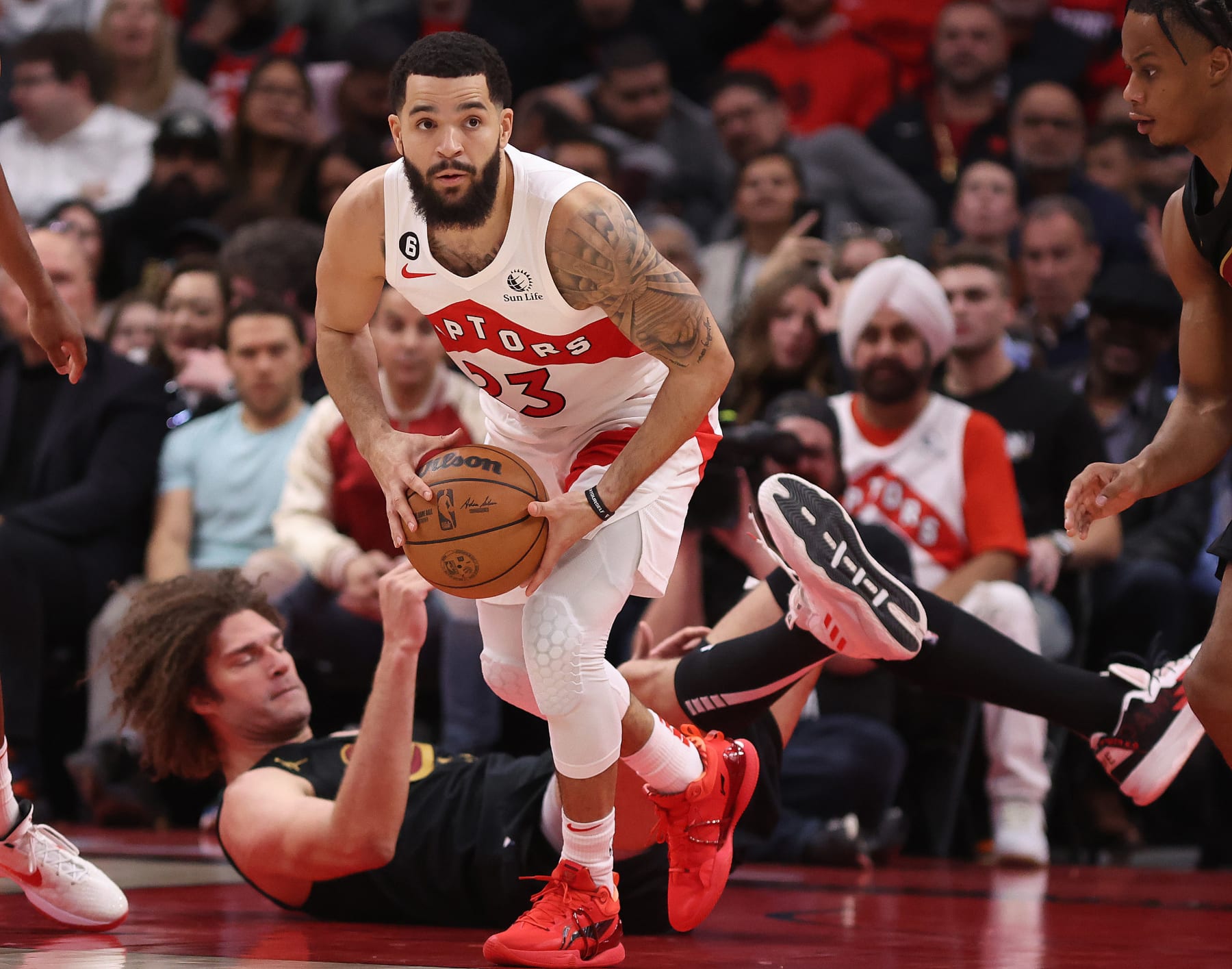 TORONTO, ON - NOVEMBER 28 - Toronto Raptors guard Fred VanVleet (23) looks to pass after Cleveland Cavaliers center Robin Lopez (33) falls as the Toronto Raptors beat the Cleveland Cavaliers 100-88 at Scotiabank Arena in Toronto, November 28, 2022.        (Steve Russell/Toronto Star via Getty Images)