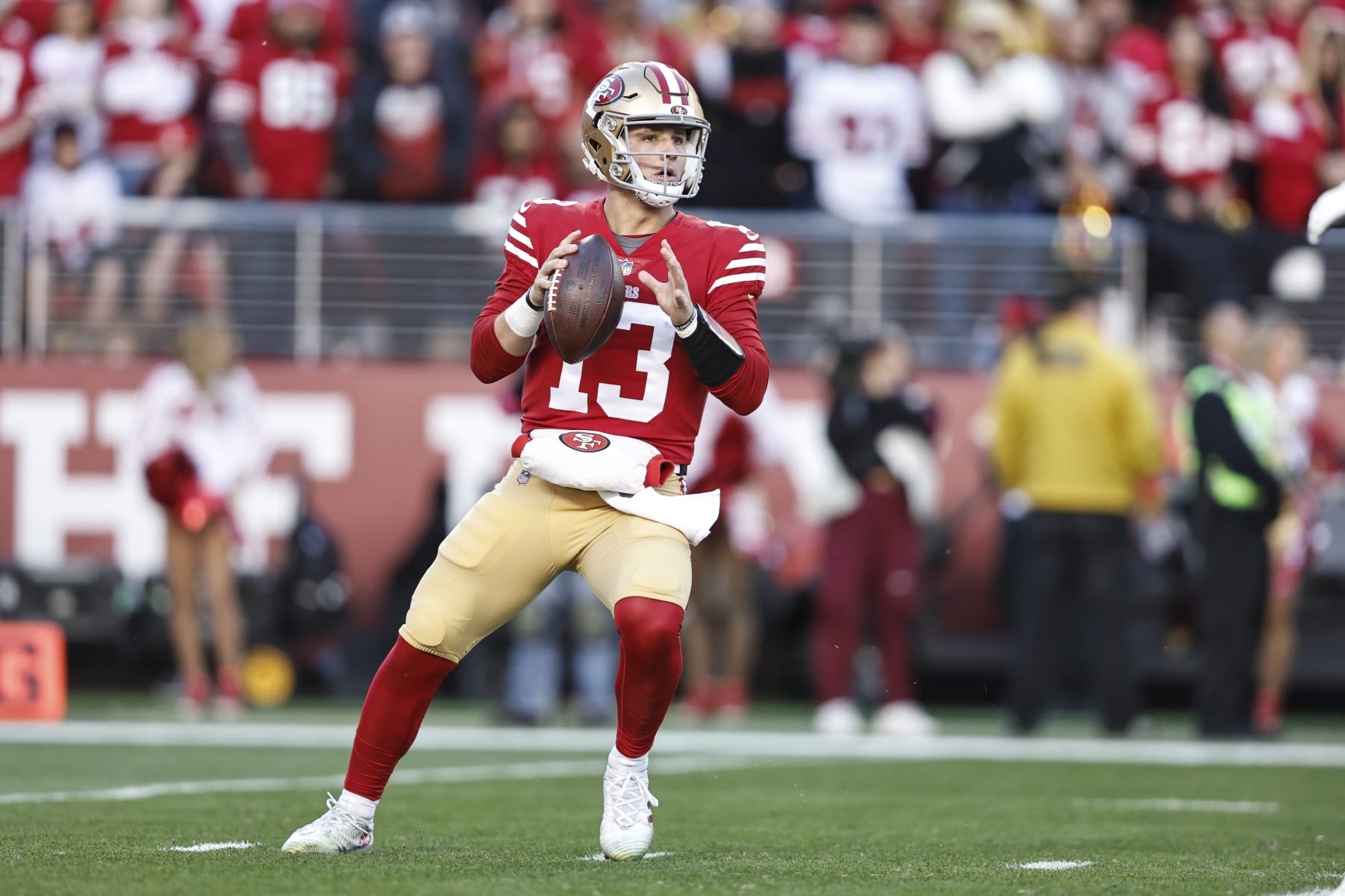 SANTA CLARA, CALIFORNIA - JANUARY 22: Brock Purdy #13 of the San Francisco 49ers drops back to pass during an NFL divisional round playoff football game between the San Francisco 49ers and the Dallas Cowboys at Levi's Stadium on January 22, 2023 in Santa Clara, California. (Photo by Michael Owens/Getty Images)