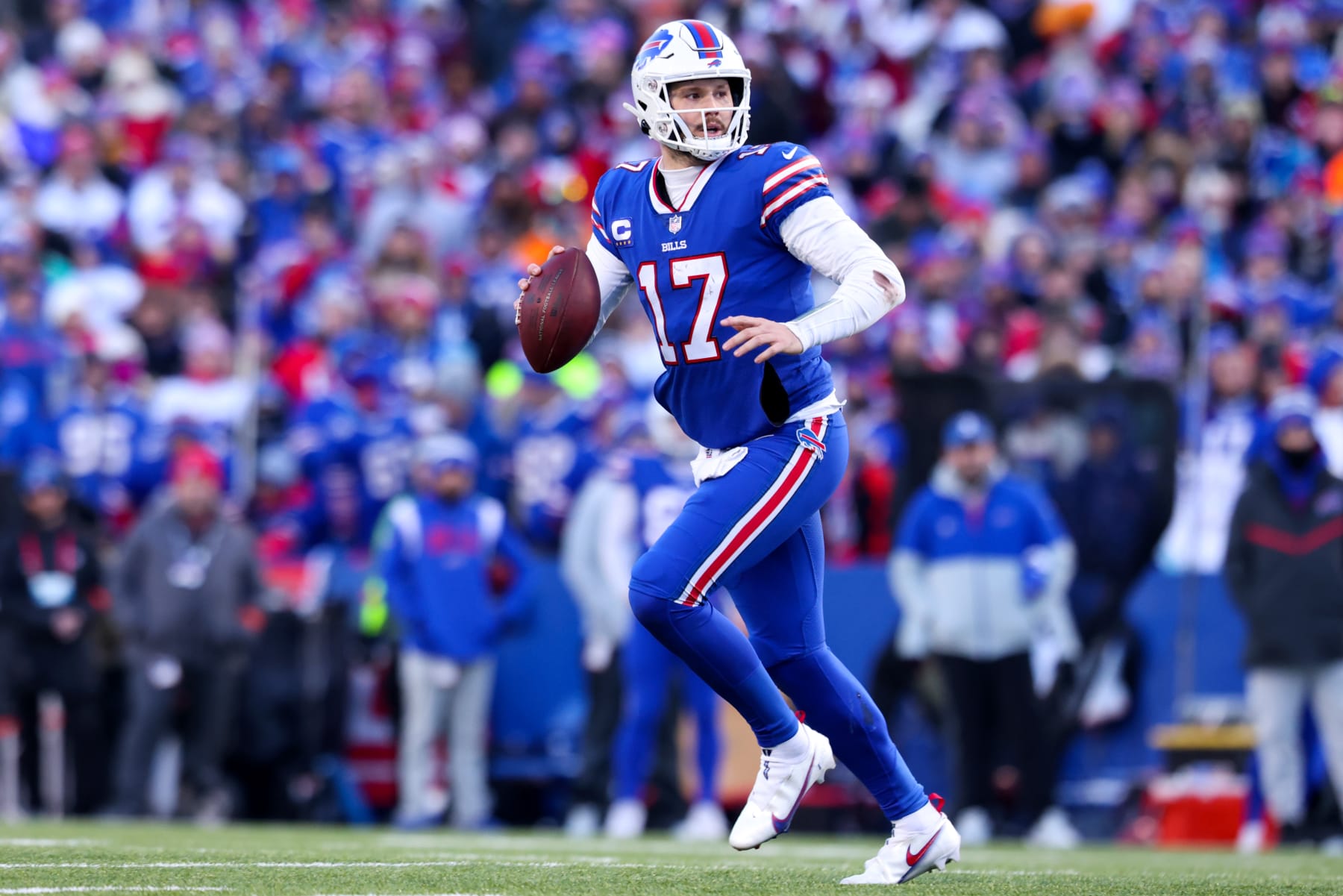 ORCHARD PARK, NEW YORK - JANUARY 15: Josh Allen #17 of the Buffalo Bills looks to pass against the Miami Dolphins during the second half of the game in the AFC Wild Card playoff game at Highmark Stadium on January 15, 2023 in Orchard Park, New York. (Photo by Bryan M. Bennett/Getty Images)