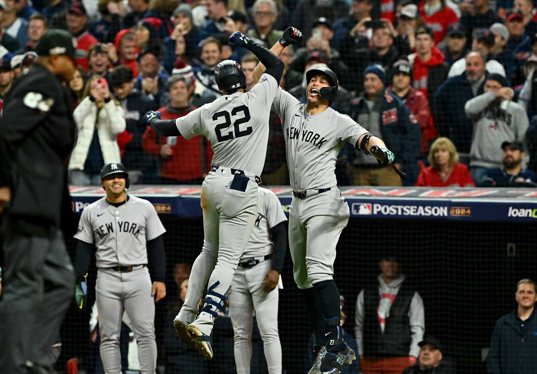 CLEVELAND, OHIO - OCTOBER 19: Juan Soto #22 and Aaron Judge #99 of the New York Yankees celebrate after Soto hit a home run in the 10th inning against the Cleveland Guardians during Game Five of the American League Championship Series at Progressive Field on October 19, 2024 in Cleveland, Ohio. (Photo by Jason Miller/Getty Images)
