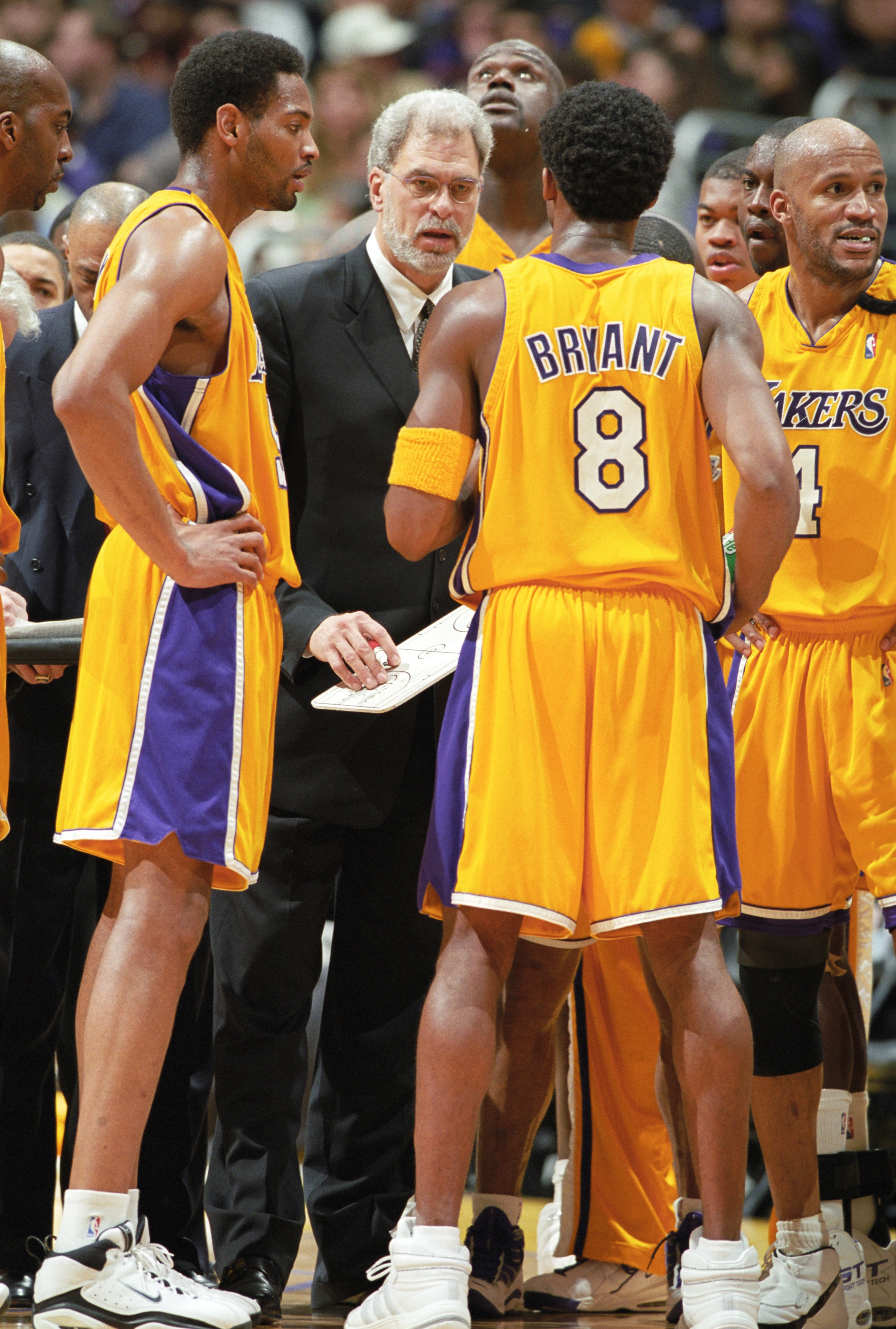 FILE:  Los Angeles Lakers head coach Phil Jackson speaks with Kobe Bryant and Robert Horry during a National Basketball Association game at the Staples Center in Los Angeles, CA. (Photo by Matt A. Brown/Icon Sportswire via Getty Images)