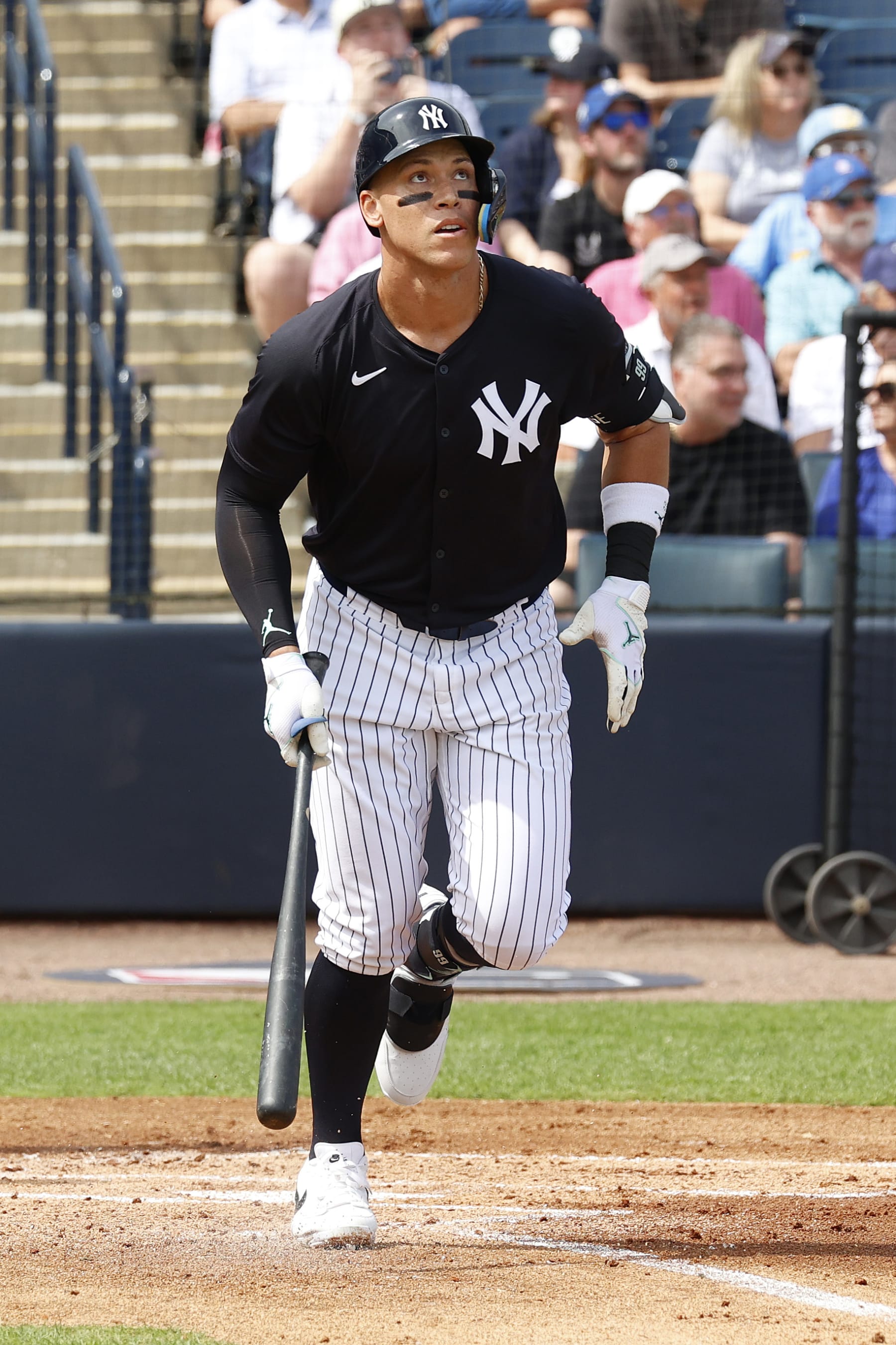 TAMPA, FL - MARCH 06: New York Yankees  center fielder Aaron Judge (99) runs up the first baseline after hitting the ball against the Tampa Bay Rays during Spring Training on March 6, 2024, at George M. Steinbrenner Field in Tampa, Florida. (Photo by Brian Spurlock/Icon Sportswire via Getty Images)