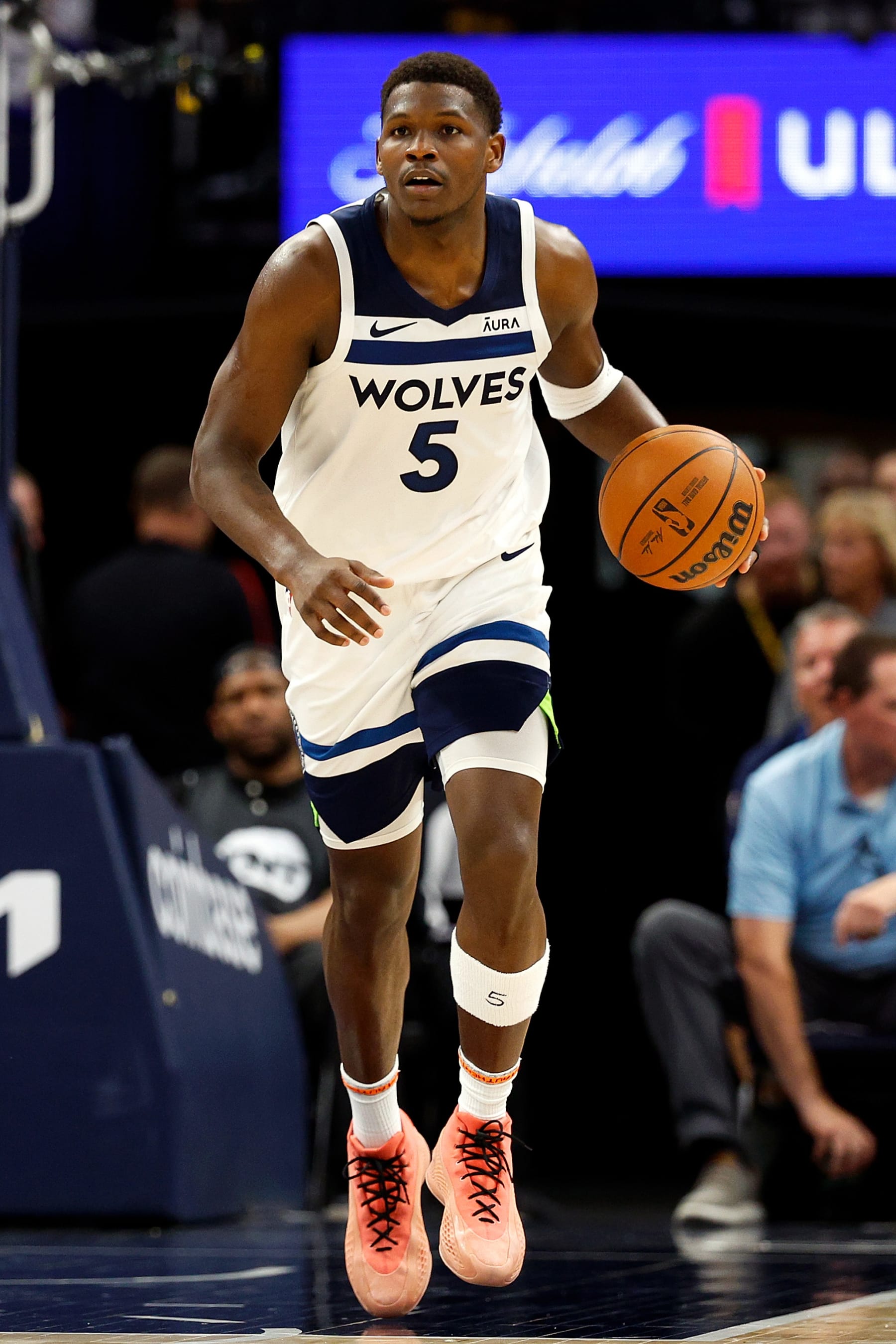 MINNEAPOLIS, MINNESOTA - MAY 12: Anthony Edwards #5 of the Minnesota Timberwolves dribbles the ball against the Denver Nuggets in the second quarter of Game Four of the Western Conference Second Round Playoffs at Target Center on May 12, 2024 in Minneapolis, Minnesota. The Nuggets defeated the Timberwolves 115-107. (Photo by David Berding/Getty Images)