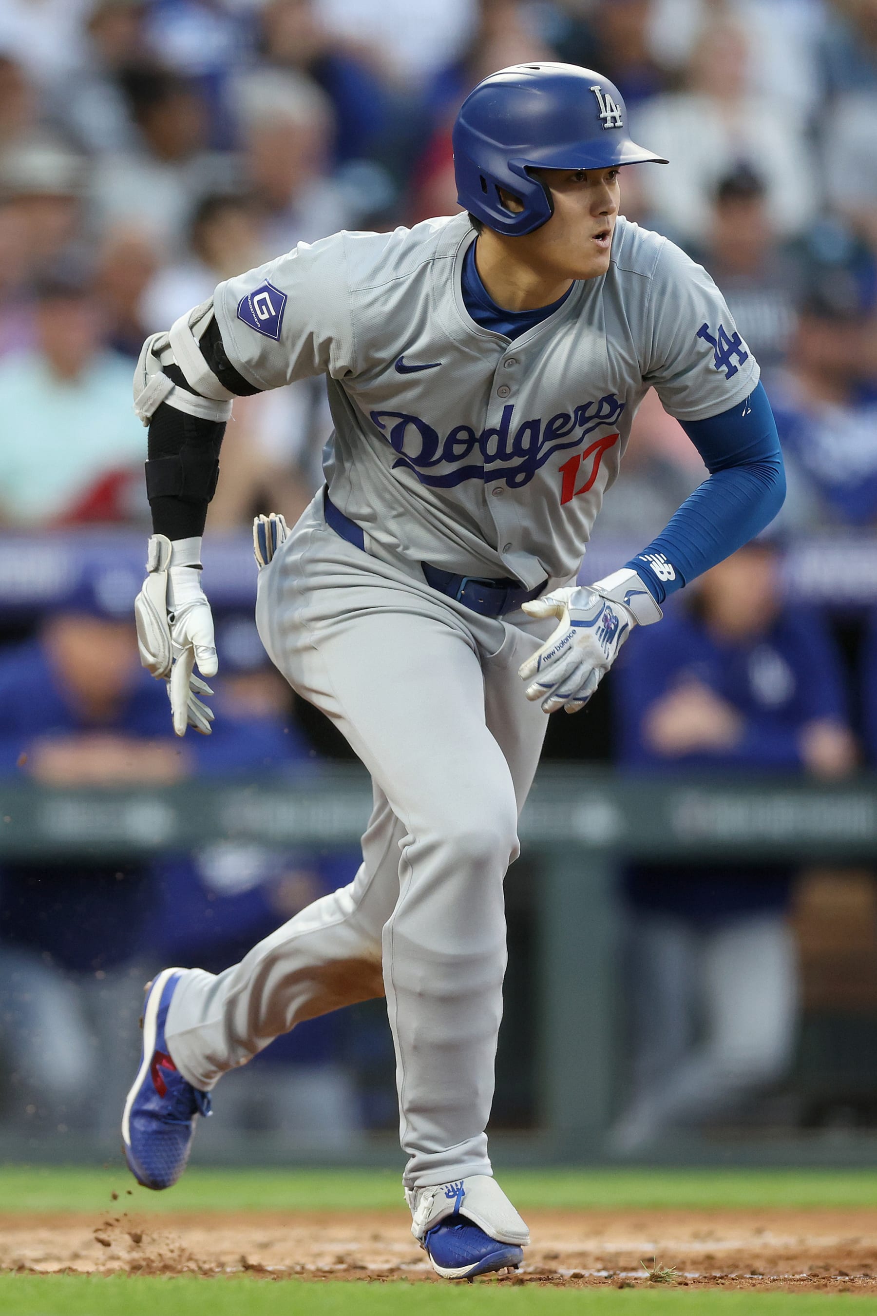DENVER, COLORADO - JUNE 19: Shohei Ohtani #17 of the Los Angles Dodgers hits a single against the Colorado Rockies in the sixth inning at Coors Field on June 19, 2024 in Denver, Colorado. (Photo by Matthew Stockman/Getty Images)