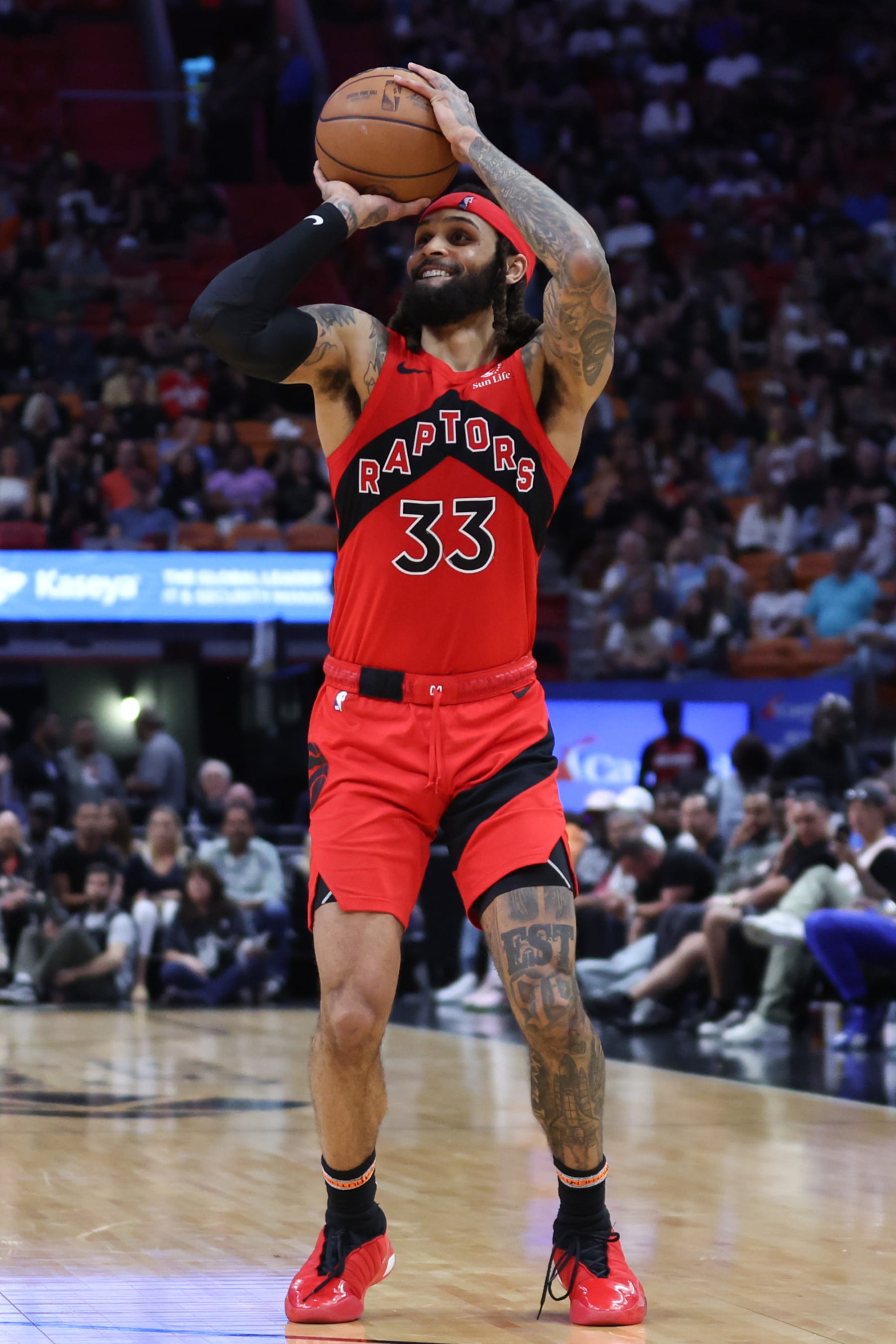 MIAMI, FLORIDA - APRIL 12: Gary Trent Jr. #33 of the Toronto Raptors shoots the ball against the Miami Heat during the third quarter of the game at Kaseya Center on April 12, 2024 in Miami, Florida. NOTE TO USER: User expressly acknowledges and agrees that, by downloading and or using this photograph, User is consenting to the terms and conditions of the Getty Images License Agreement. (Photo by Megan Briggs/Getty Images)