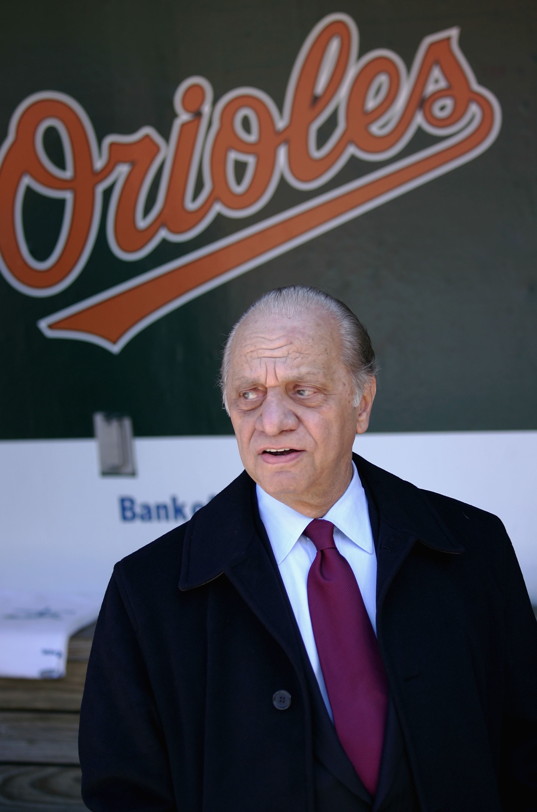 BALTIMORE - APRIL 4:  Owner Peter Angelos of the Baltimore Orioles watches pregame festivities from the duggout prior to the Baltimore Orioles defeating the Oakland Athletics 4-0 on opening day, April 4, 2005 at Oriole Park at Camden Yards in Baltimore, Maryland.  (Photo by Doug Pensinger /Getty Images)