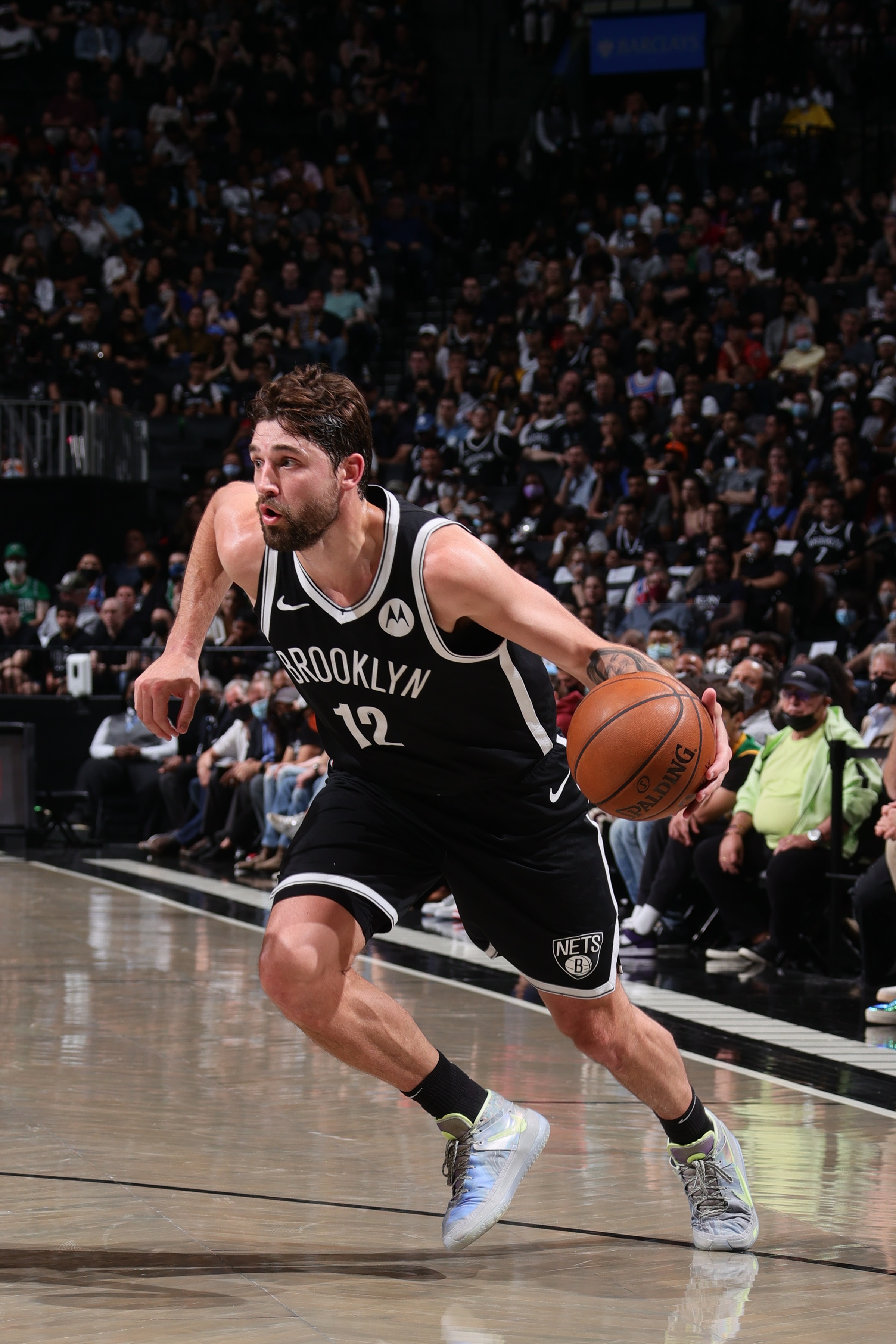 BROOKLYN, NY -  MAY 22: Joe Harris #12 of the Brooklyn Nets drives to the basket against the Boston Celtics during Round 1, Game 1 of the 2021 NBA Playoffs on May 22, 2021 at Barclays Center in Brooklyn, New York. NOTE TO USER: User expressly acknowledges and agrees that, by downloading and or using this Photograph, user is consenting to the terms and conditions of the Getty Images License Agreement. Mandatory Copyright Notice: Copyright 2021 NBAE (Photo by Nathaniel S. Butler/NBAE via Getty Images)