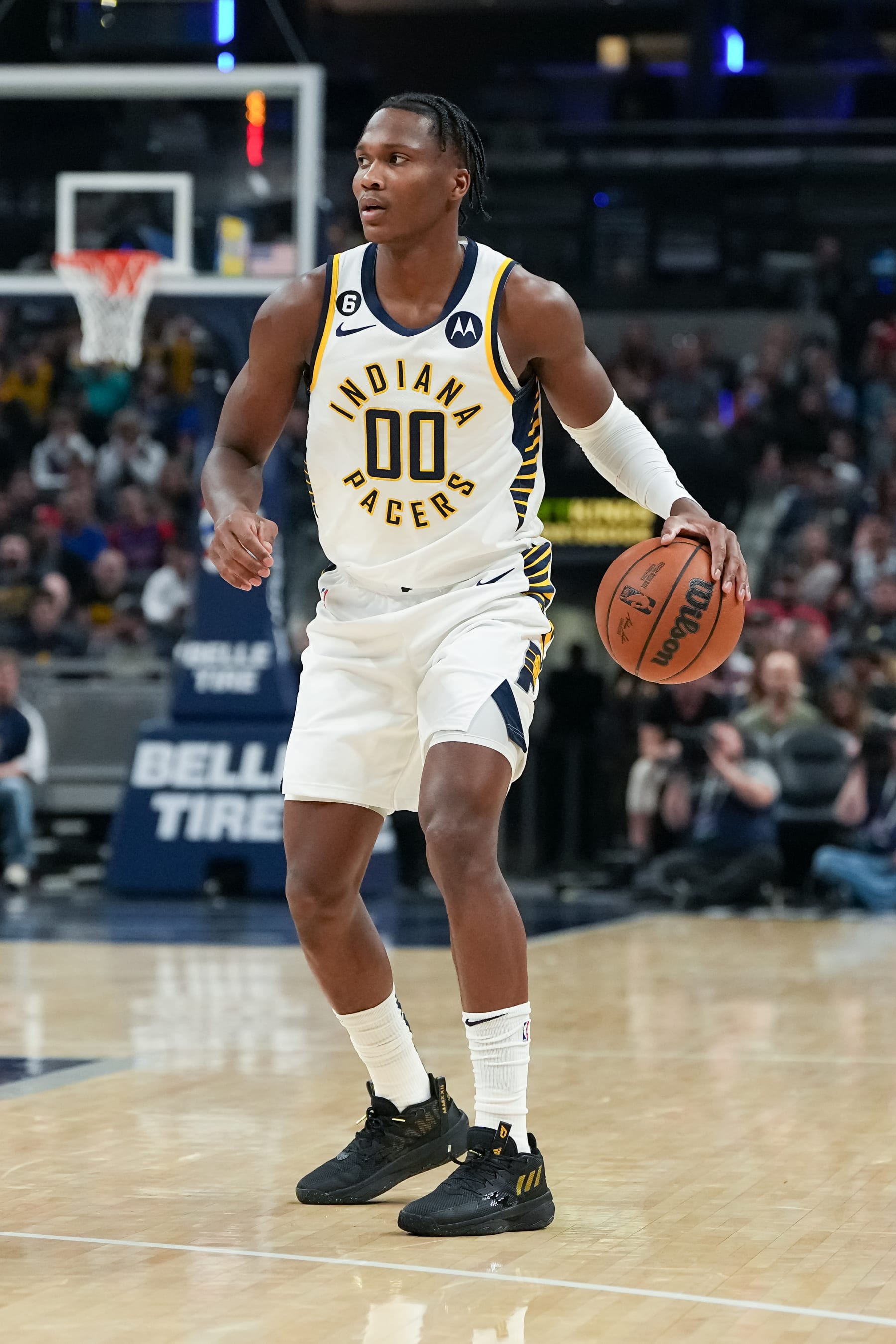 INDIANAPOLIS, INDIANA - OCTOBER 22: Bennedict Mathurin #00 of the Indiana Pacers dribbles the ball in the first quarter against the Detroit Pistons at Gainbridge Fieldhouse on October 22, 2022 in Indianapolis, Indiana. NOTE TO USER: User expressly acknowledges and agrees that, by downloading and or using this photograph, User is consenting to the terms and conditions of the Getty Images License Agreement. (Photo by Dylan Buell/Getty Images)