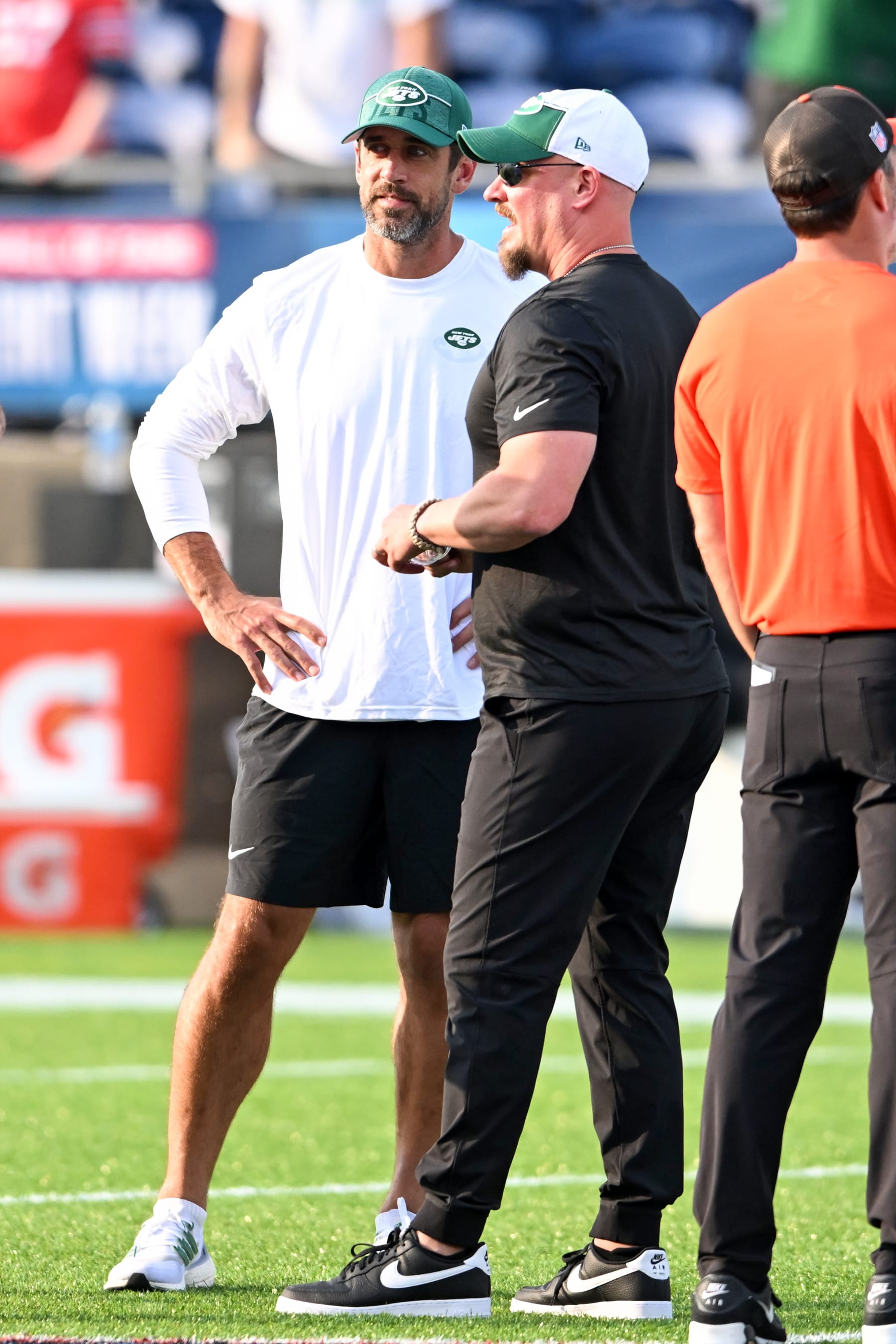CANTON, OHIO - AUGUST 03: Aaron Rodgers #8 of the New York Jets talks with offensive coordinator Nathaniel Hackett prior to the 2023 Pro Hall of Fame Game against the Cleveland Browns at Tom Benson Hall Of Fame Stadium on August 3, 2023 in Canton, Ohio. (Photo by Nick Cammett/Getty Images)