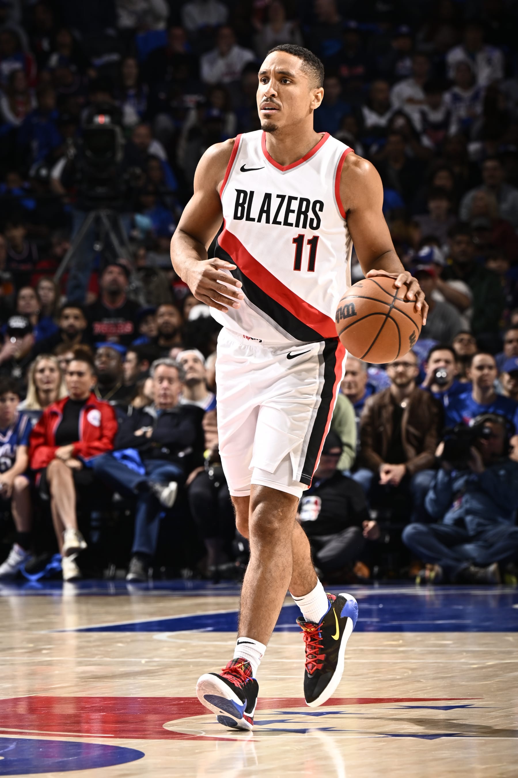 PHILADELPHIA, PA - OCTOBER 29: Malcolm Brogdon #11 of the Portland Trail Blazers brings the ball up court against the Philadelphia 76ers on October 29, 2023 at the Wells Fargo Center in Philadelphia, Pennsylvania NOTE TO USER: User expressly acknowledges and agrees that, by downloading and/or using this Photograph, user is consenting to the terms and conditions of the Getty Images License Agreement. Mandatory Copyright Notice: Copyright 2023 NBAE (Photo by David Dow/NBAE via Getty Images)