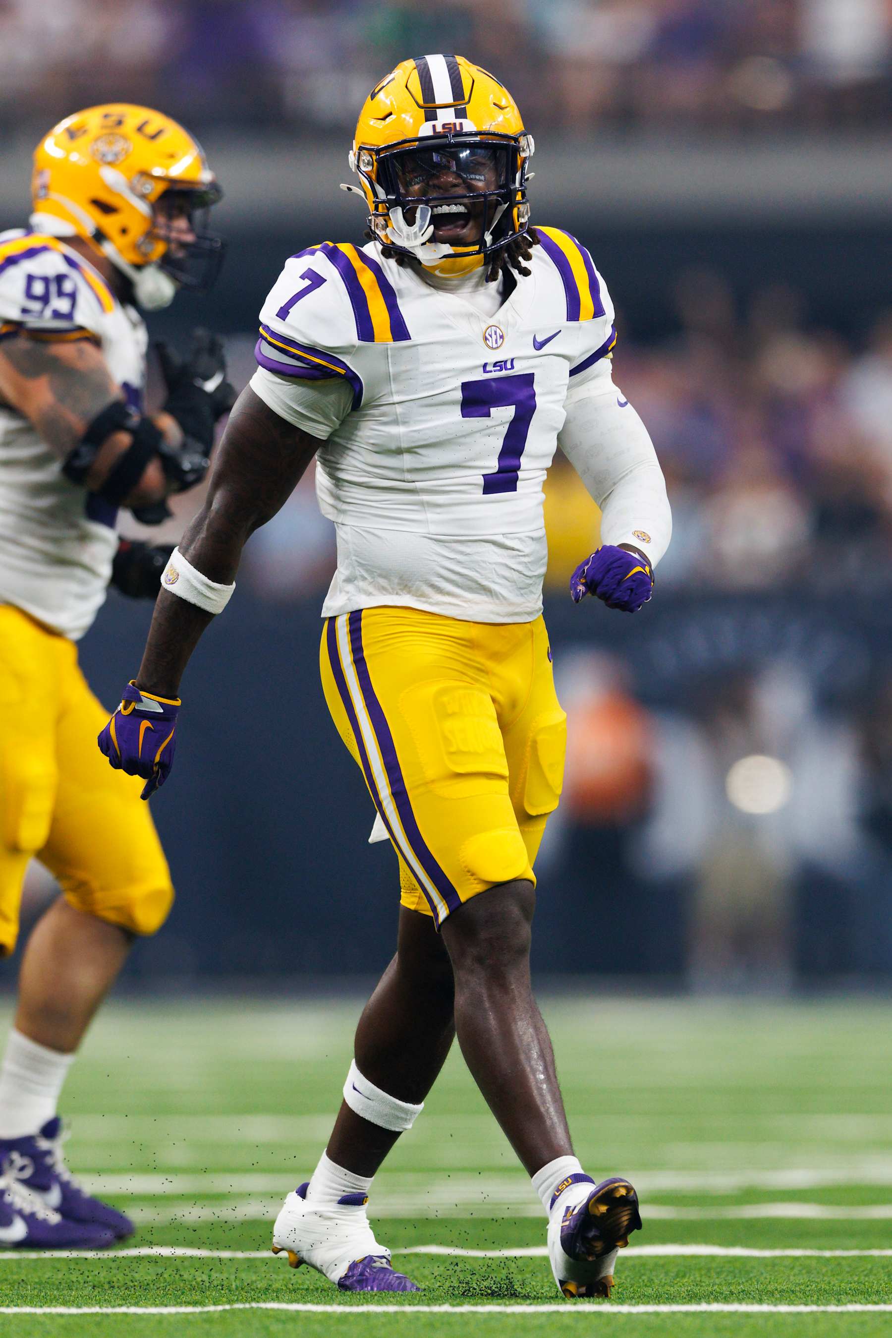 LAS VEGAS, NEVADA - SEPTEMBER 1: Harold Perkins Jr. #7 of the LSU Tigers celebrates during the Vegas Kickoff Classic against USC Trojans at Allegiant Stadium on September 1, 2024 in Las Vegas, Nevada. (Photo by Ric Tapia/Getty Images)
