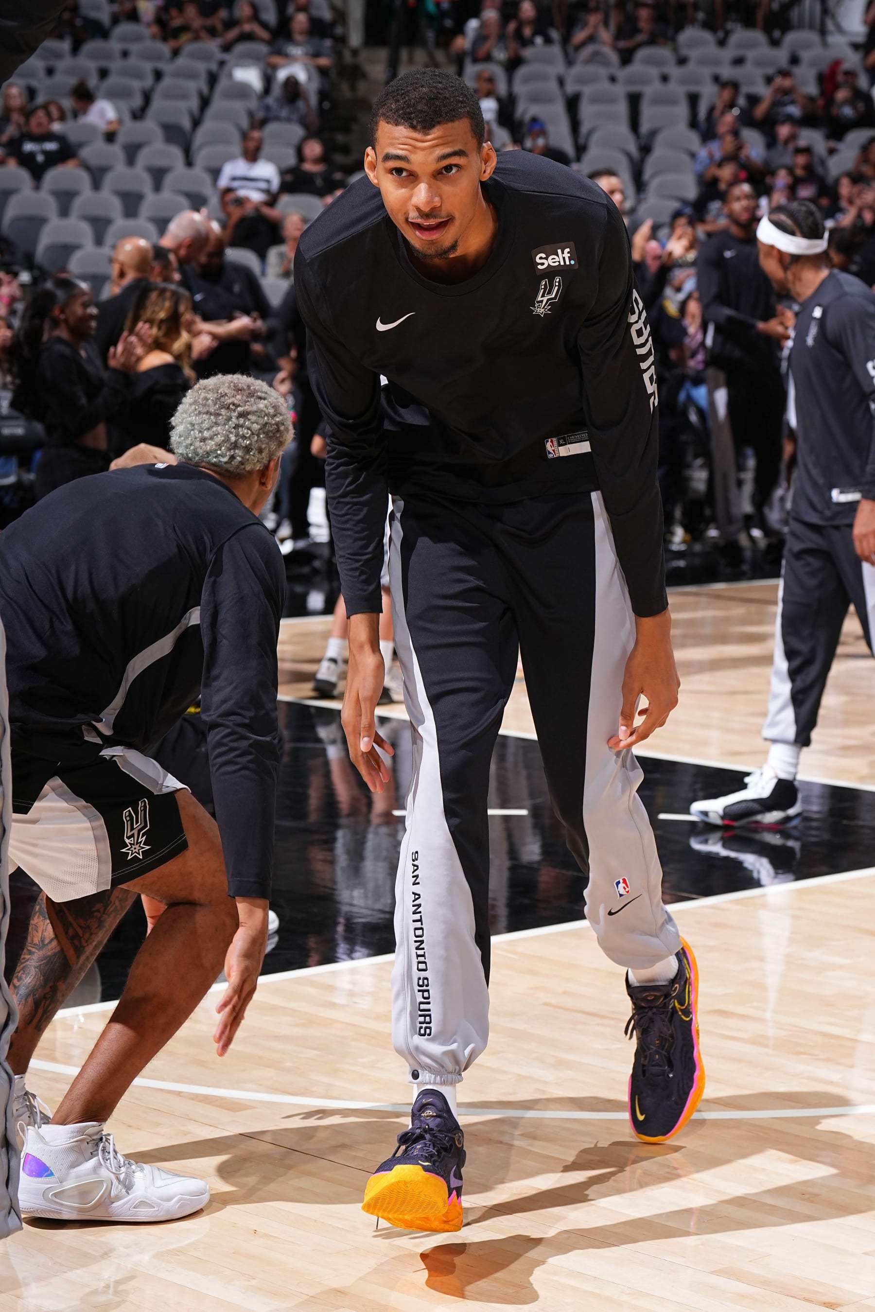 SAN ANTONIO, TX - OCTOBER 13: Victor Wembanyama #1 of the San Antonio Spurs is introduced before the game against the Miami Heat on October 13, 2023 at the Frost Bank Center in San Antonio, Texas. NOTE TO USER: User expressly acknowledges and agrees that, by downloading and/or using this Photograph, user is consenting to the terms and conditions of the Getty Images License Agreement. Mandatory Copyright Notice: Copyright 2023 NBAE (Photo by Garrett Ellwood/NBAE via Getty Images)