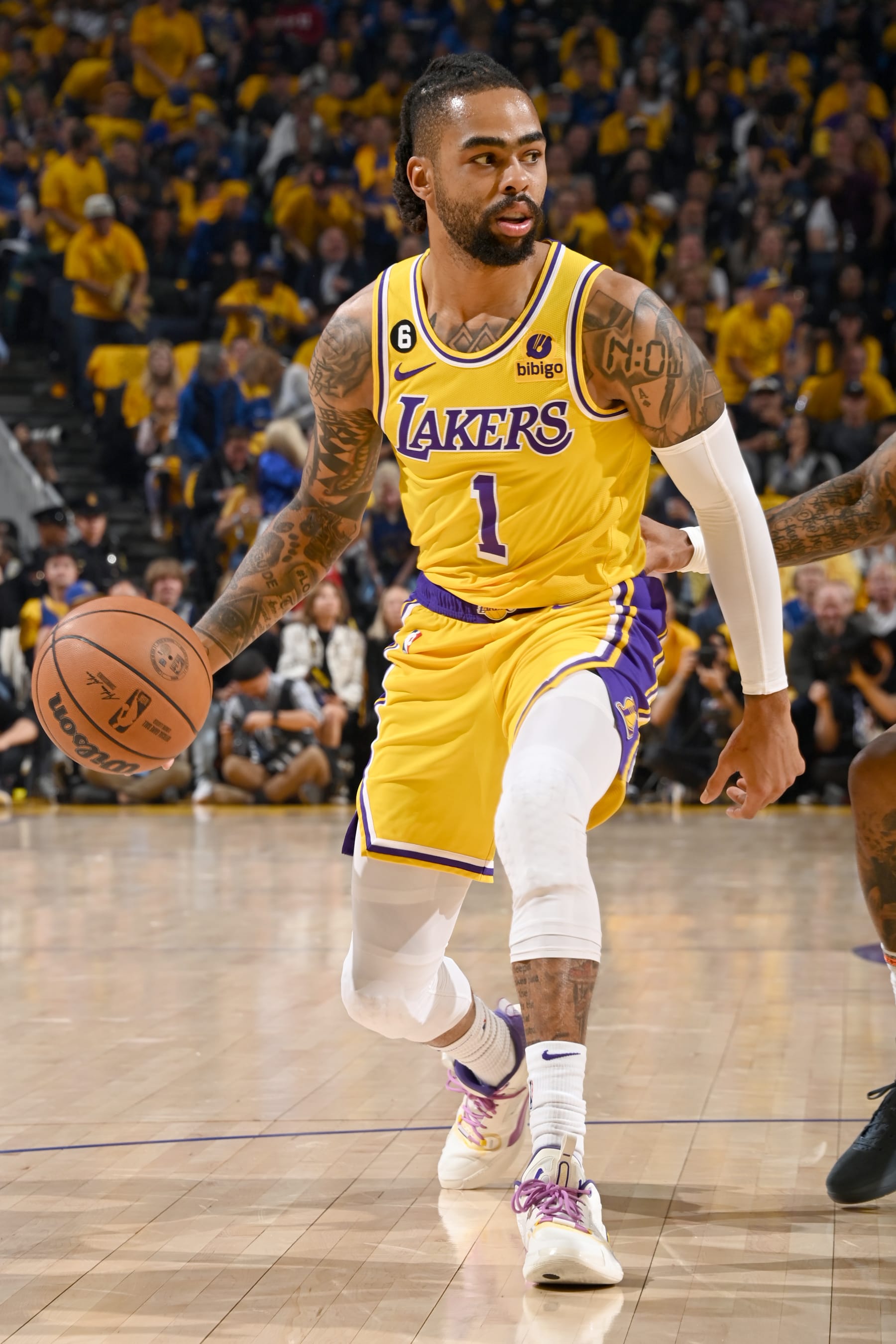 SAN FRANCISCO, CA - MAY 10:  D'Angelo Russell #1 of the Los Angeles Lakers dribbles the ball during Game 5 of the Western Conference Semi-Finals of the 2023 NBA Playoffs against the Golden State Warriors on May 10, 2023 at Chase Center in San Francisco, California. NOTE TO USER: User expressly acknowledges and agrees that, by downloading and or using this photograph, user is consenting to the terms and conditions of Getty Images License Agreement. Mandatory Copyright Notice: Copyright 2023 NBAE (Photo by Andrew D. Bernstein/NBAE via Getty Images)