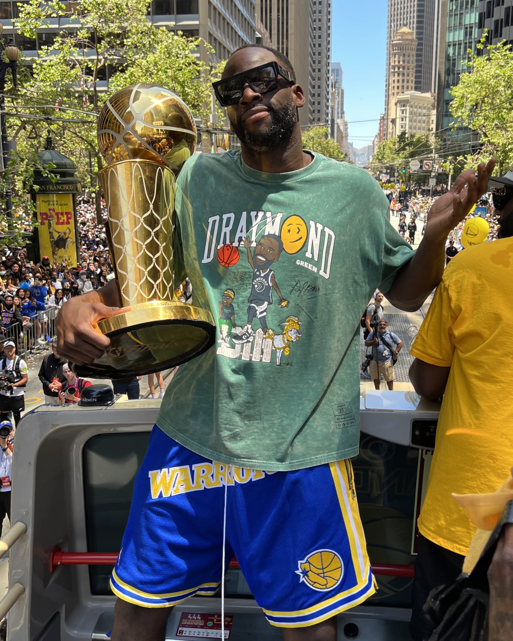 SAN FRANCISCO, CA - JUNE 20:  Draymond Green #23 of the Golden State Warriors poses for a photograph with the Larry O'Brien NBA Championship Trophy during their 2022 Victory Parade & Rally on June 20, 2022 at Chase Center in San Francisco, California. NOTE TO USER: User expressly acknowledges and agrees that, by downloading and or using this photograph, user is consenting to the terms and conditions of Getty Images License Agreement. Mandatory Copyright Notice: Copyright 2022 NBAE (Photo by Jim Poorten/NBAE via Getty Images)