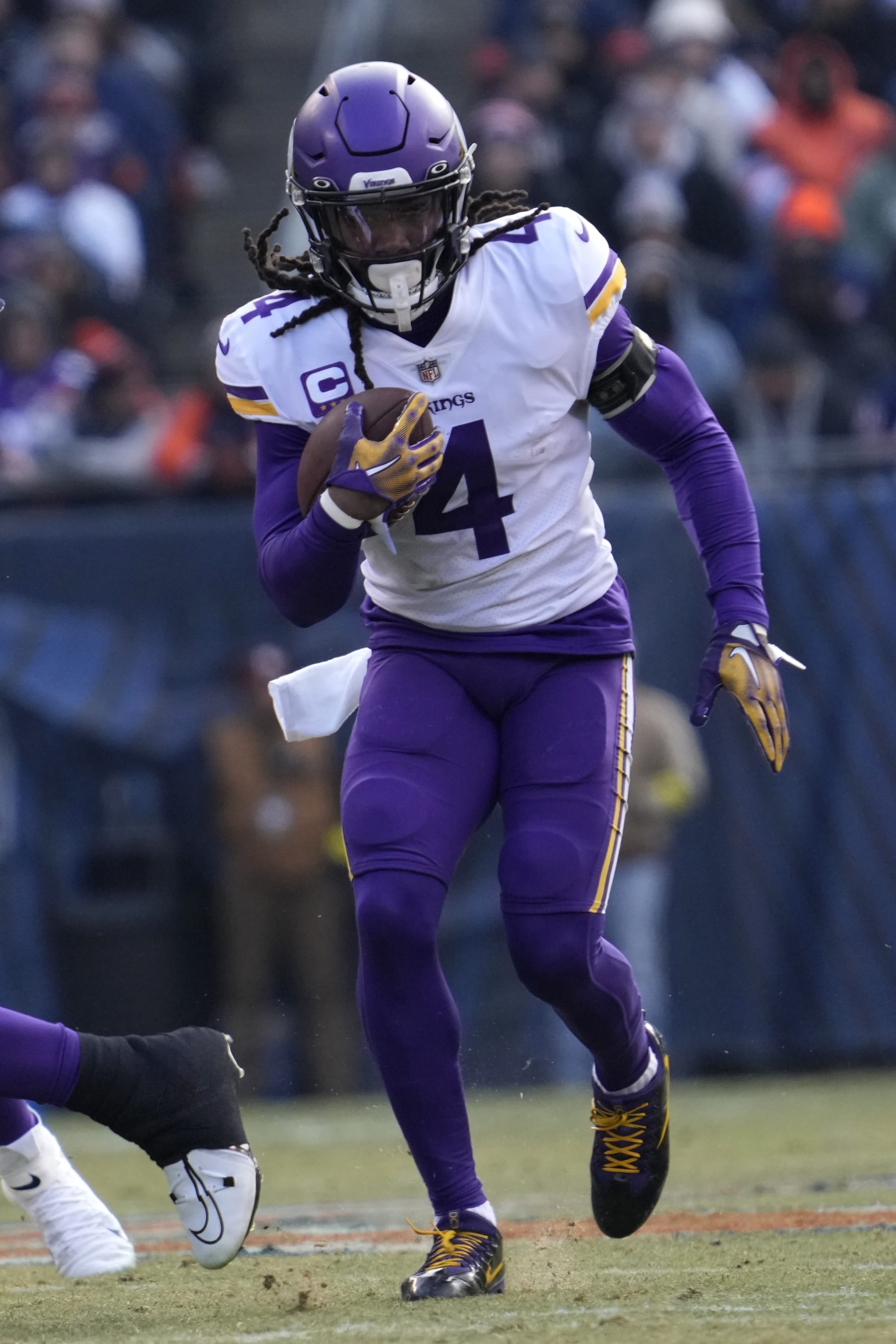 Minnesota Vikings running back Dalvin Cook carries the ball up field during the first half of an NFL football game Chicago Bears, Sunday, Jan. 8, 2023, in Chicago. (AP Photo/Nam Y. Huh)