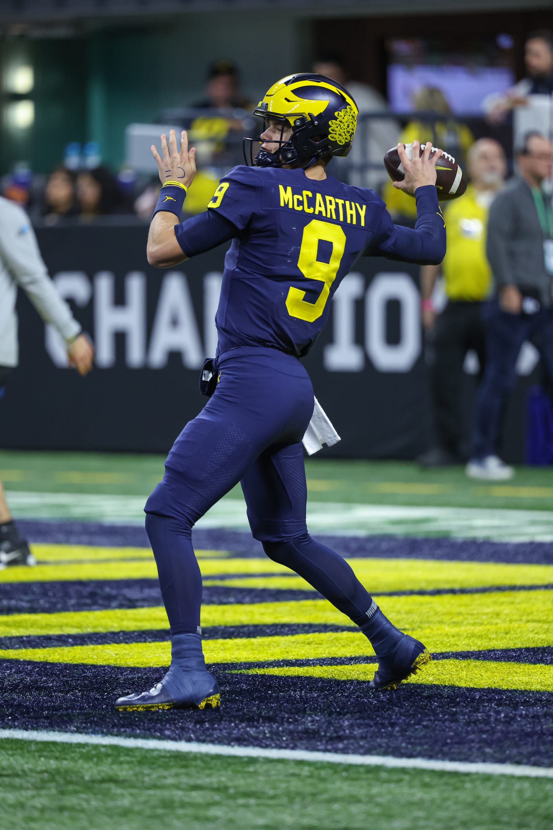 INDIANAPOLIS, IN - DECEMBER 03: J.J. McCarthy #9 of the Michigan Wolverines warms up before the game against the Purdue Boilermakers in the Big Ten Championship at Lucas Oil Stadium on December 3, 2022 in Indianapolis, Indiana. (Photo by Michael Hickey/Getty Images)