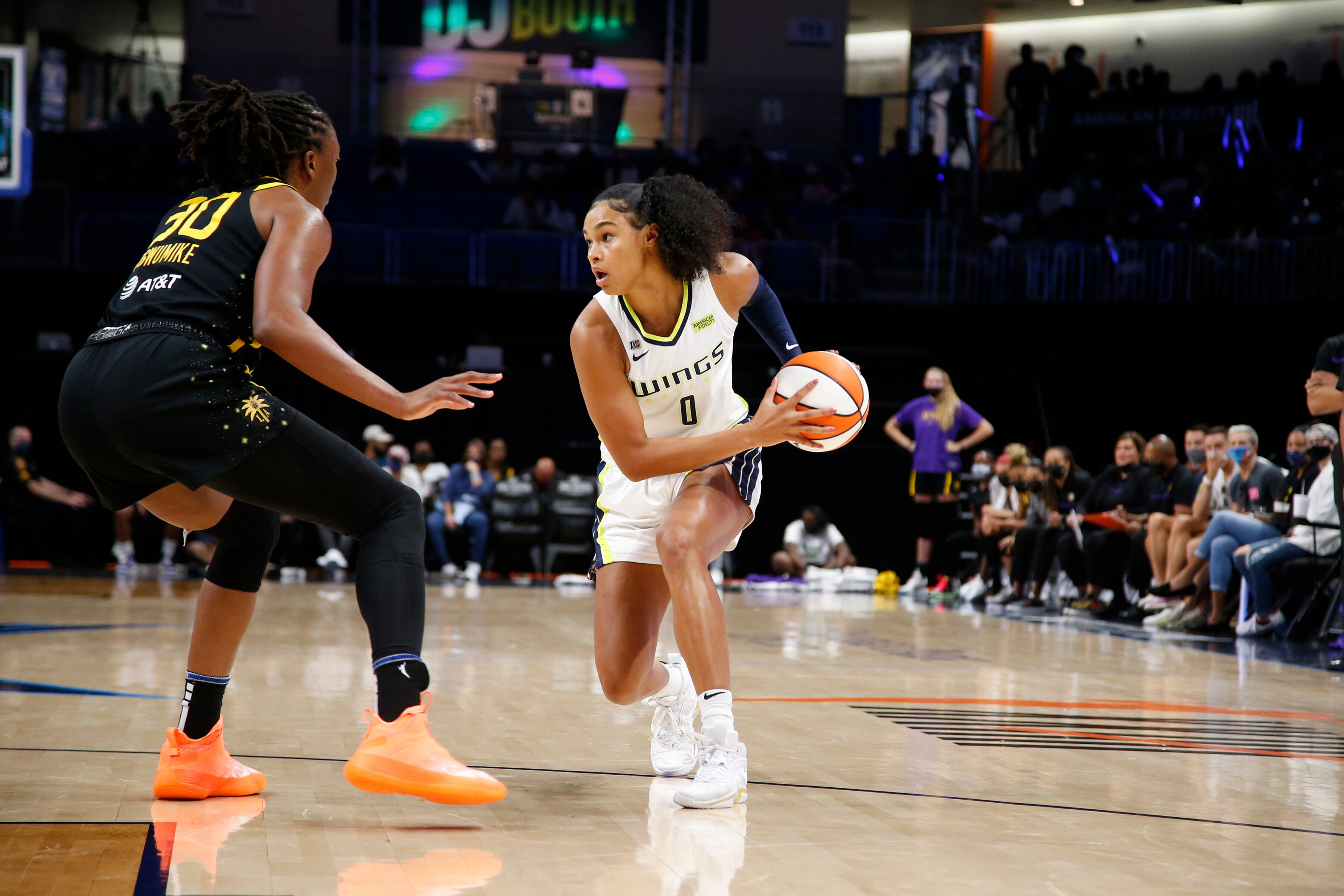 ARLINGTON, TX - SEPTEMBER 19:  Satou Sabally #0 of the Dallas Wings handles the ball during the game against the Los Angeles Sparks on September 19, 2021 at College Park Center in Arlington, Texas. NOTE TO USER: User expressly acknowledges and agrees that, by downloading and or using this Photograph, user is consenting to the terms and conditions of the Getty Images License Agreement. Mandatory Copyright Notice: Copyright 2021 NBAE (Photo by Tim Heitman/NBAE via Getty Images)