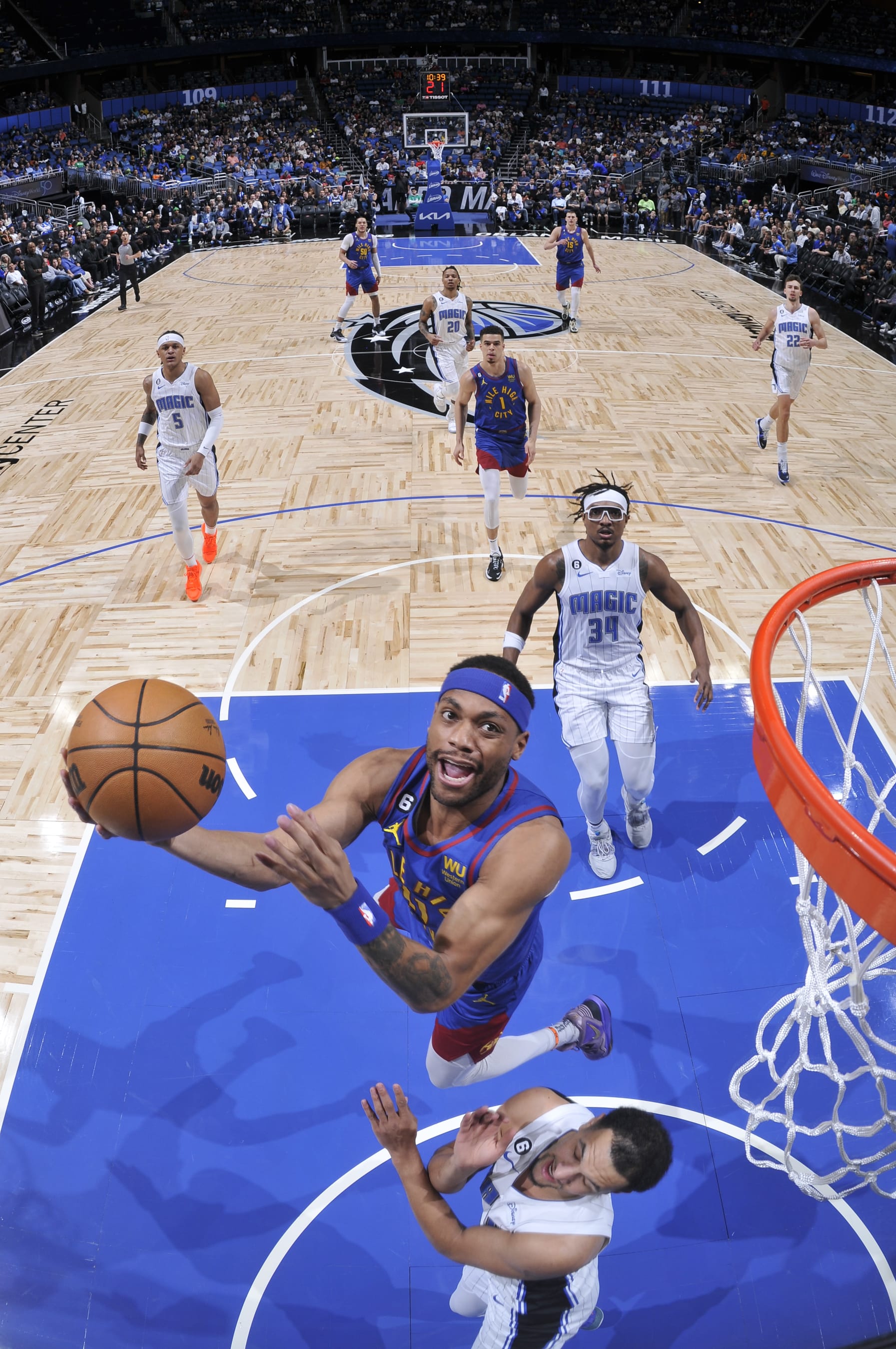 ORLANDO, FL - FEBRUARY 9: Bruce Brown #11 of the Denver Nuggets drives to the basket during the game against the Orlando Magic on February 9, 2023 at Amway Center in Orlando, Florida. NOTE TO USER: User expressly acknowledges and agrees that, by downloading and or using this photograph, User is consenting to the terms and conditions of the Getty Images License Agreement. Mandatory Copyright Notice: Copyright 2023 NBAE (Photo by Fernando Medina/NBAE via Getty Images)