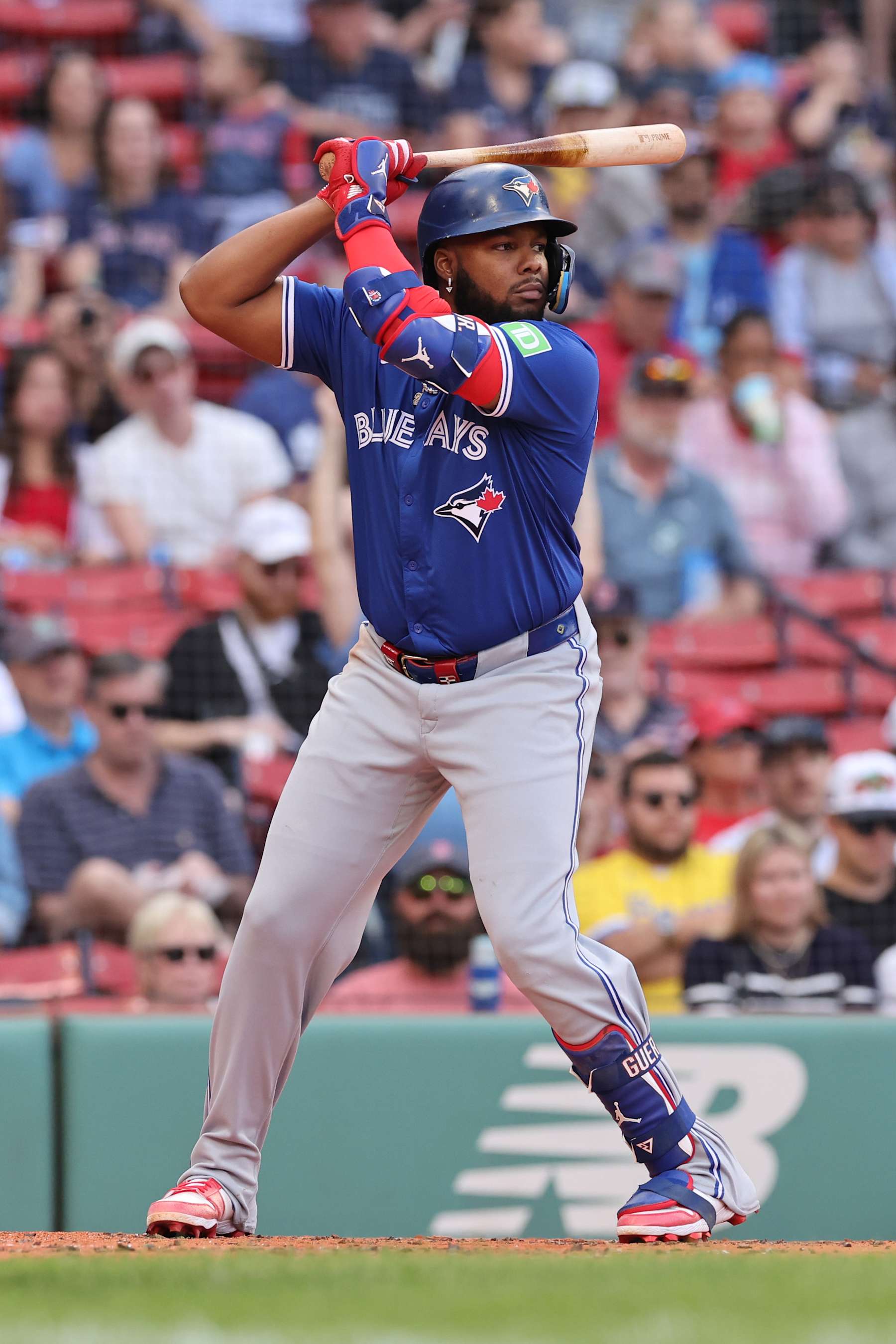 BOSTON, MASSACHUSETTS - AUGUST 26: Vladimir Guerrero Jr #27 of the Toronto Blue Jays at bat during the fourth inning against the Boston Red Sox during game one of a doubleheader at Fenway Park on August 26, 2024 in Boston, Massachusetts. This game is a continuation from June 26th (Photo by Paul Rutherford/Getty Images)